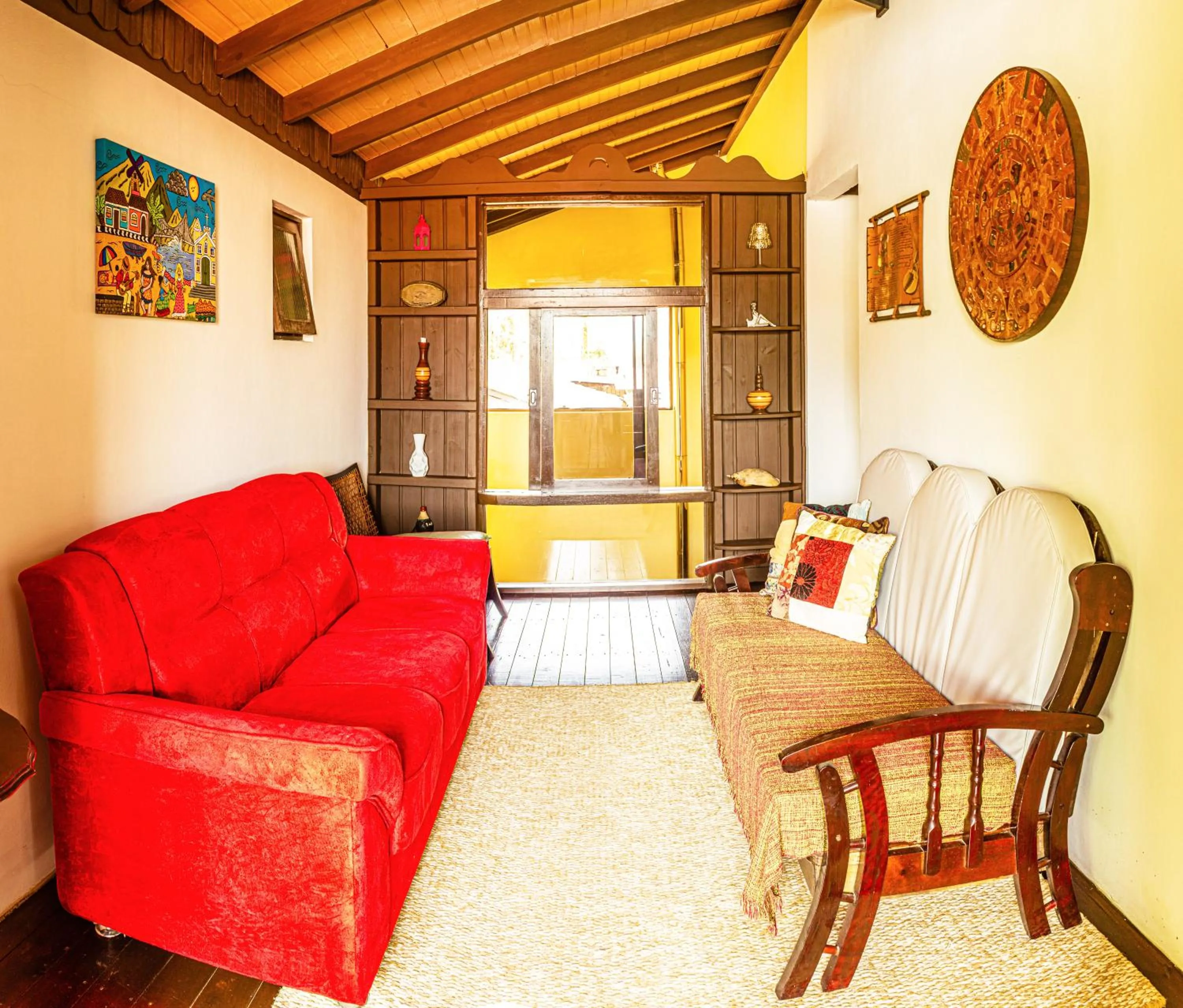 Living room in Pousada Casa do Oscar