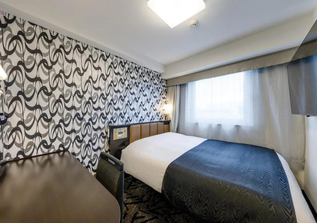 Photo of the whole room, Bed in APA Hotel Hakata Gion Ekimae