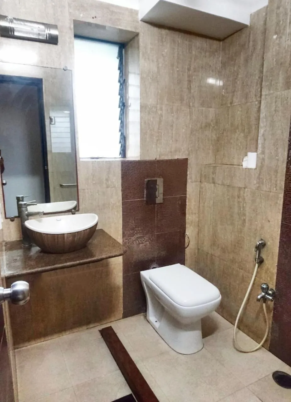 Bathroom in Tatvam Residency