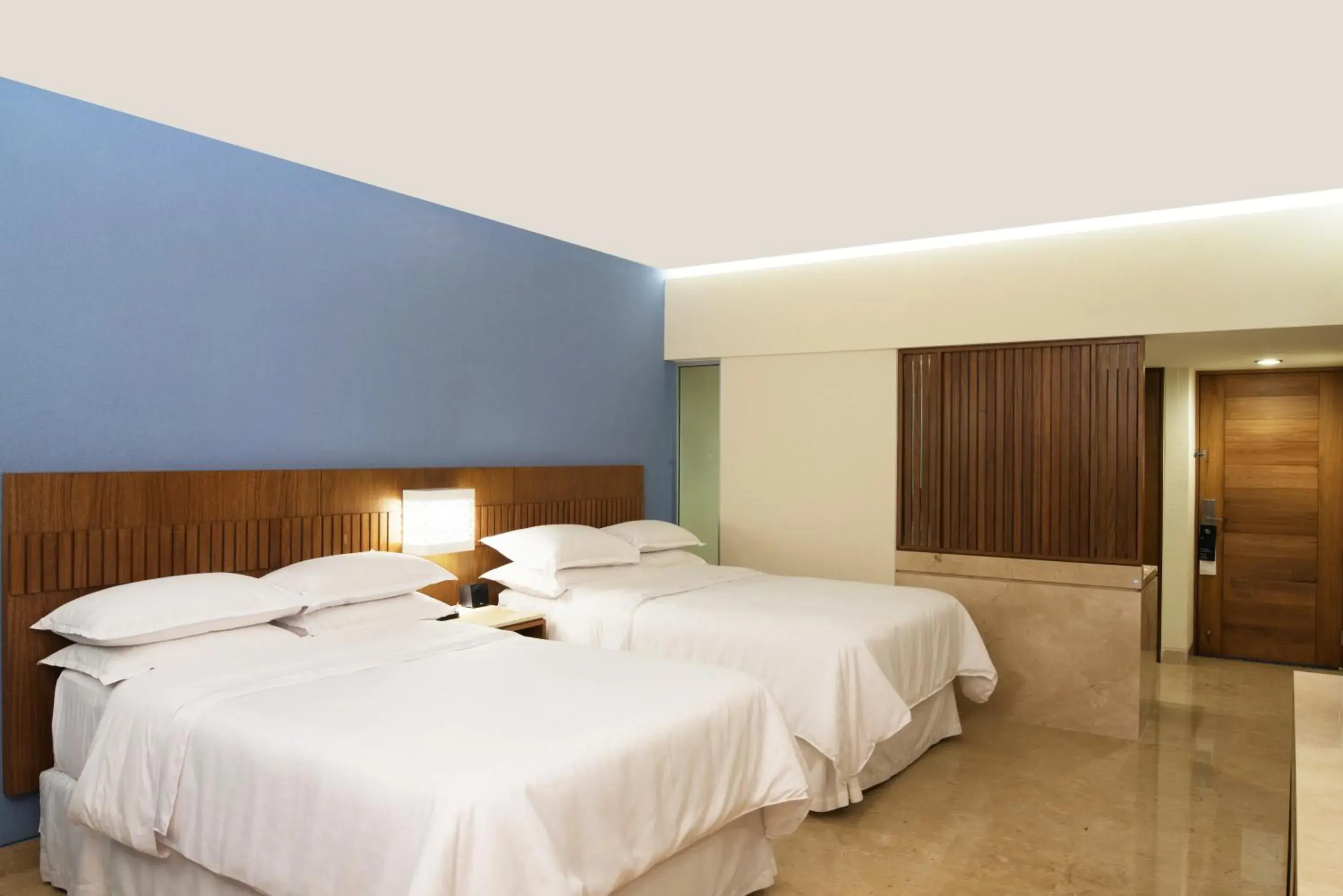 Guest room, 2 Double, Deluxe view, Garden view, Ground floor in Sheraton Buganvilias Resort & Convention Center Guest room, 2 Double, Deluxe view, Garden view, Ground floor in Sheraton Buganvilias Resort & Convention Center