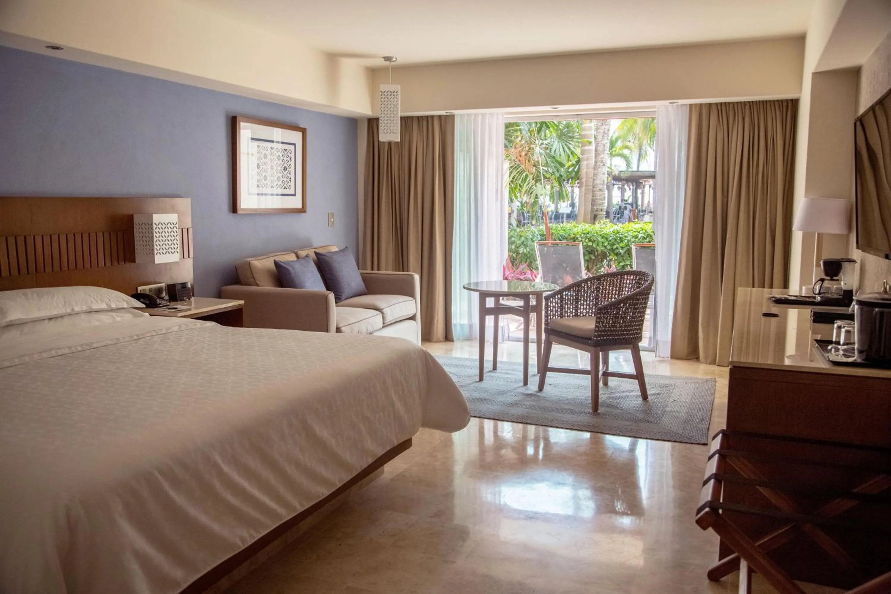 Photo of the whole room, Bed in Sheraton Buganvilias Resort & Convention Center