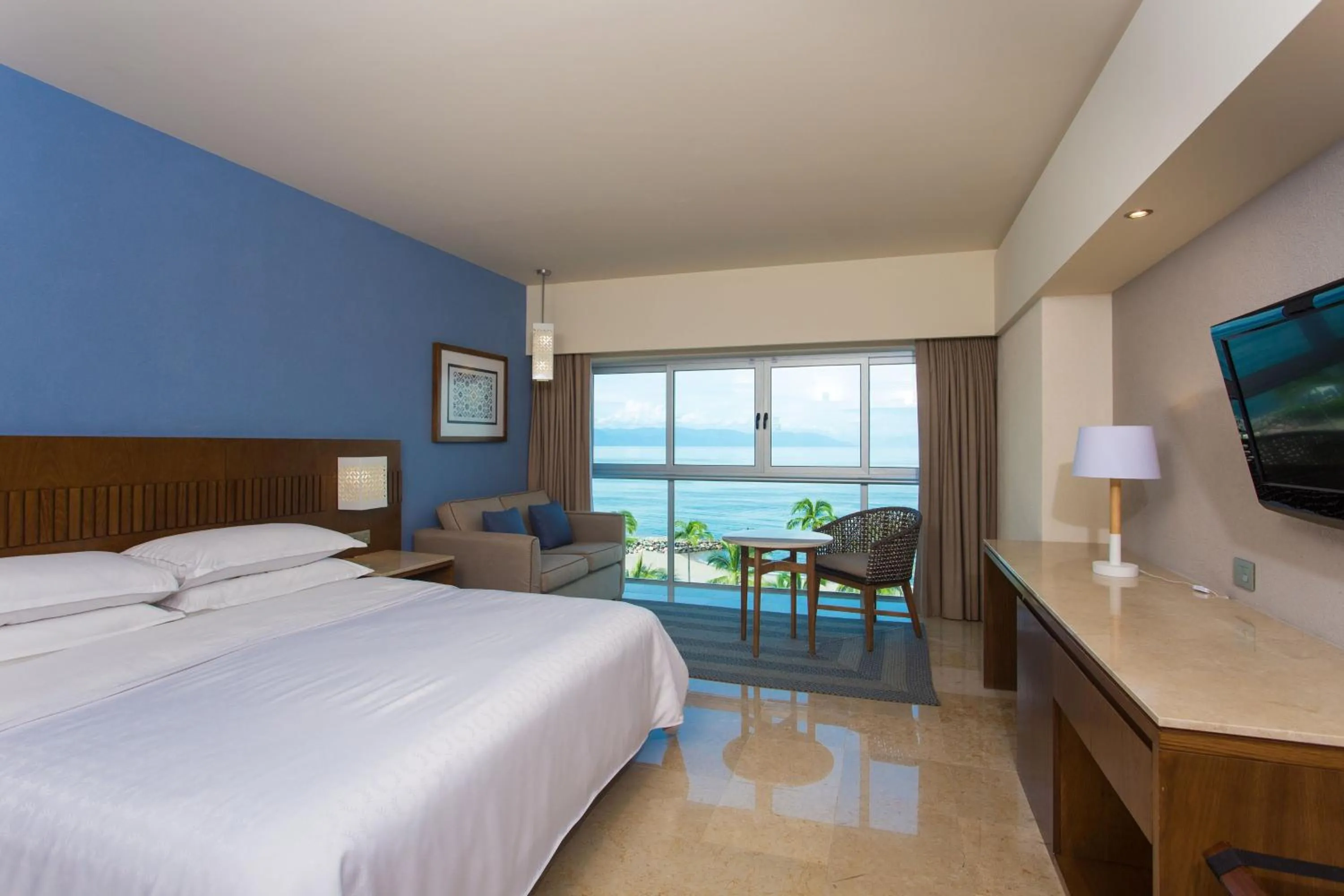 Photo of the whole room, Bed in Sheraton Buganvilias Resort & Convention Center