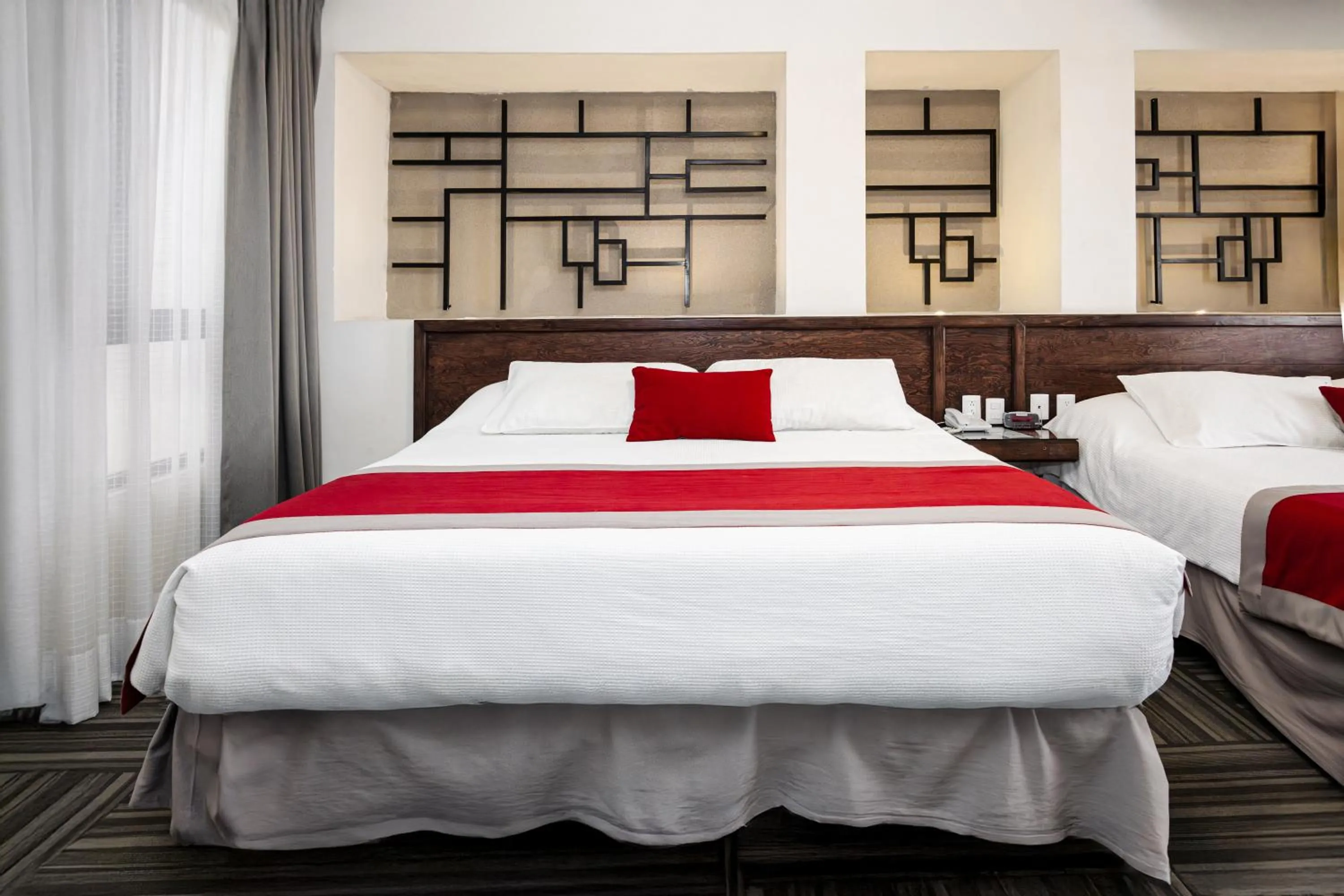 Bedroom, Bed in Ramada Plaza by Wyndham Leon