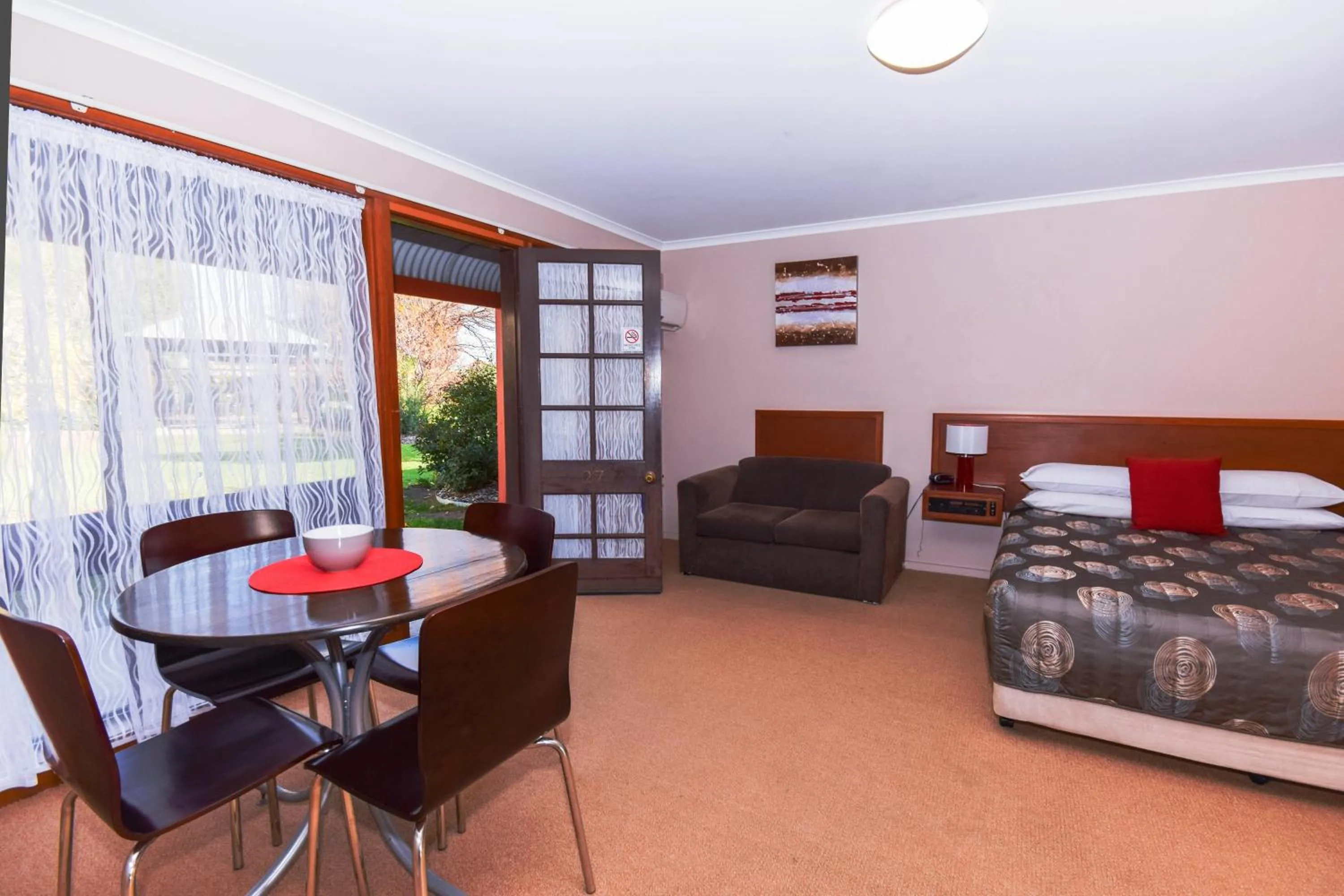 Photo of the whole room, Bed in River Country Inn