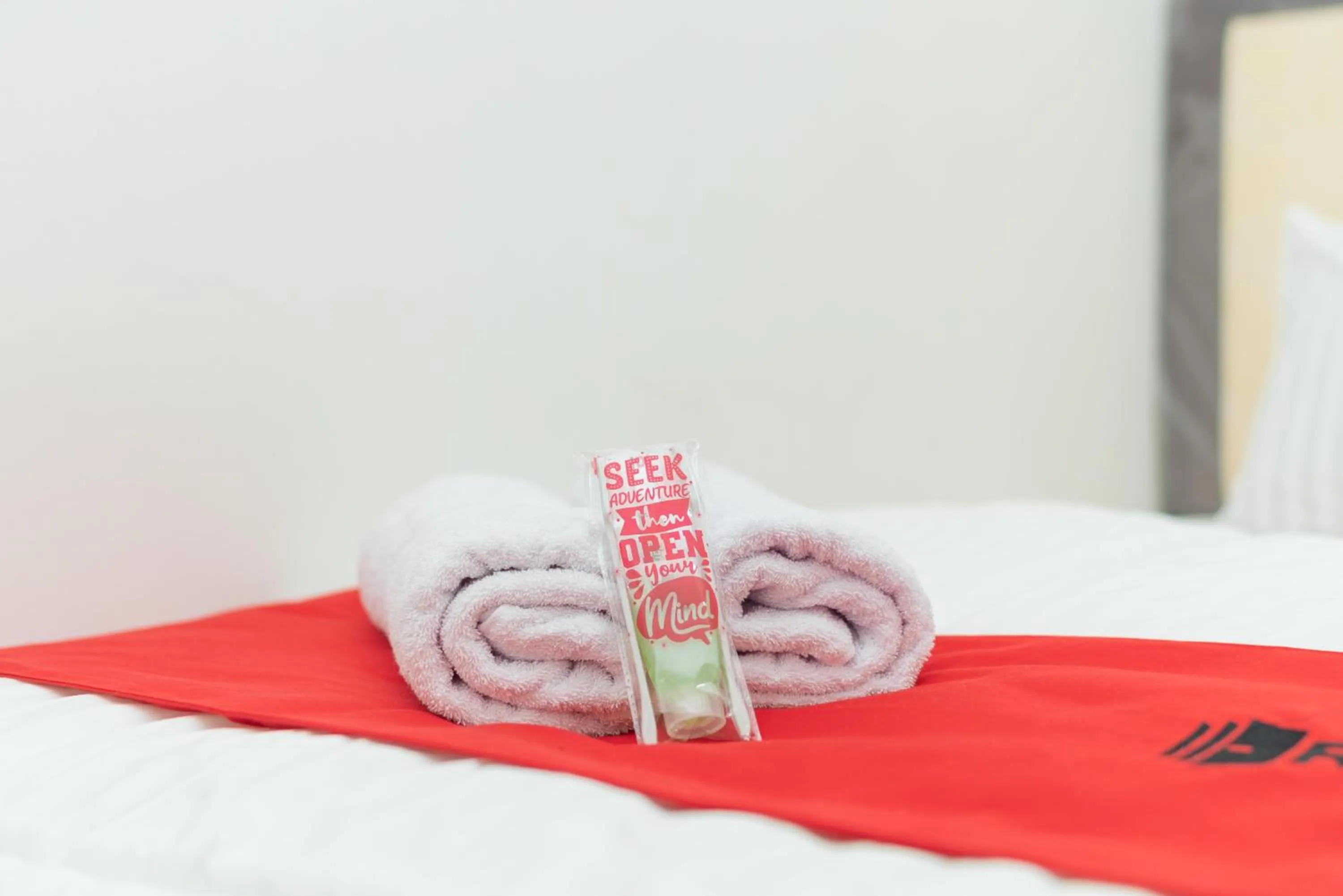 Bed in RedDoorz near Bundaran Ciceri