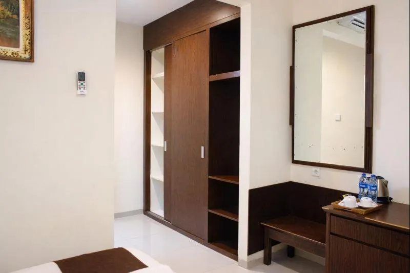 Bed in Manggar Indonesia Hotel