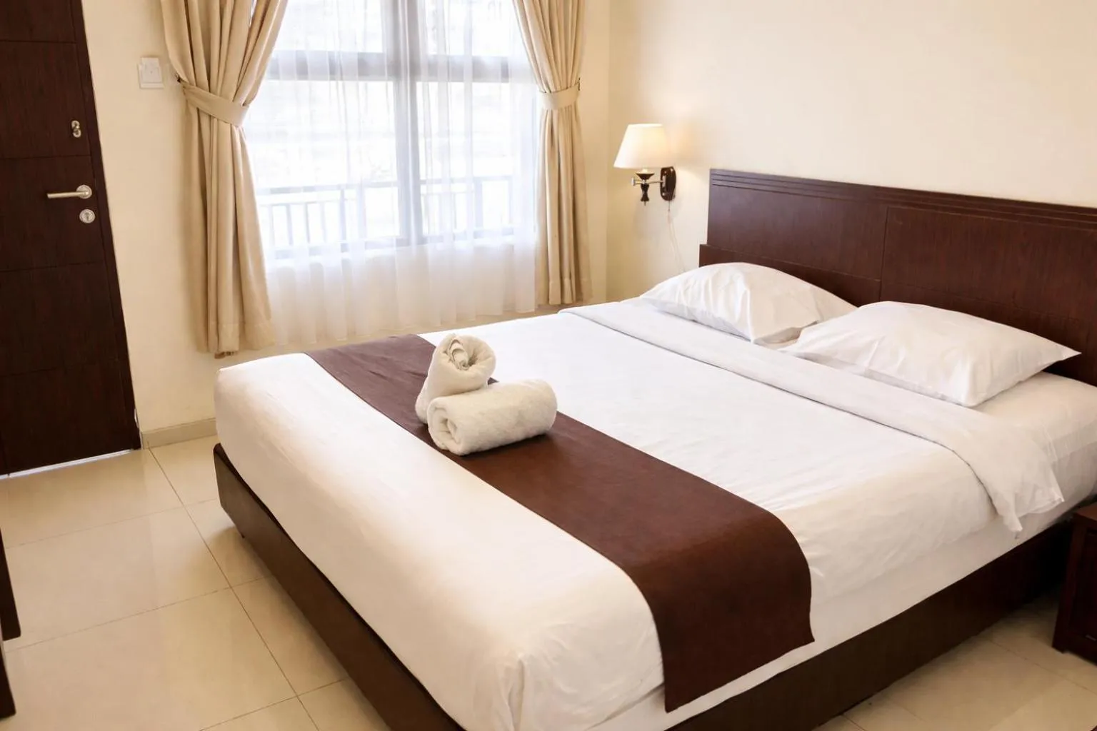 Bed in Manggar Indonesia Hotel