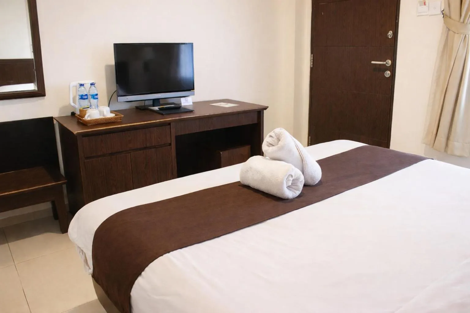 Bed in Manggar Indonesia Hotel