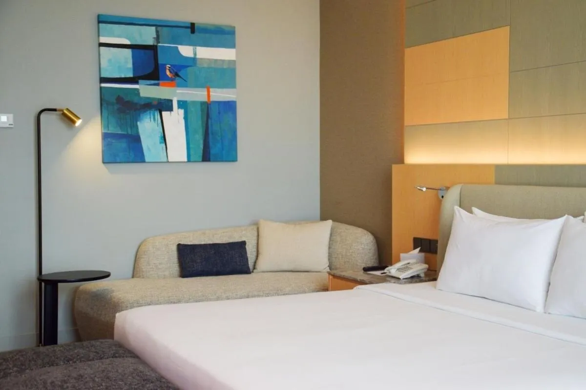 Bed in M World Hotel