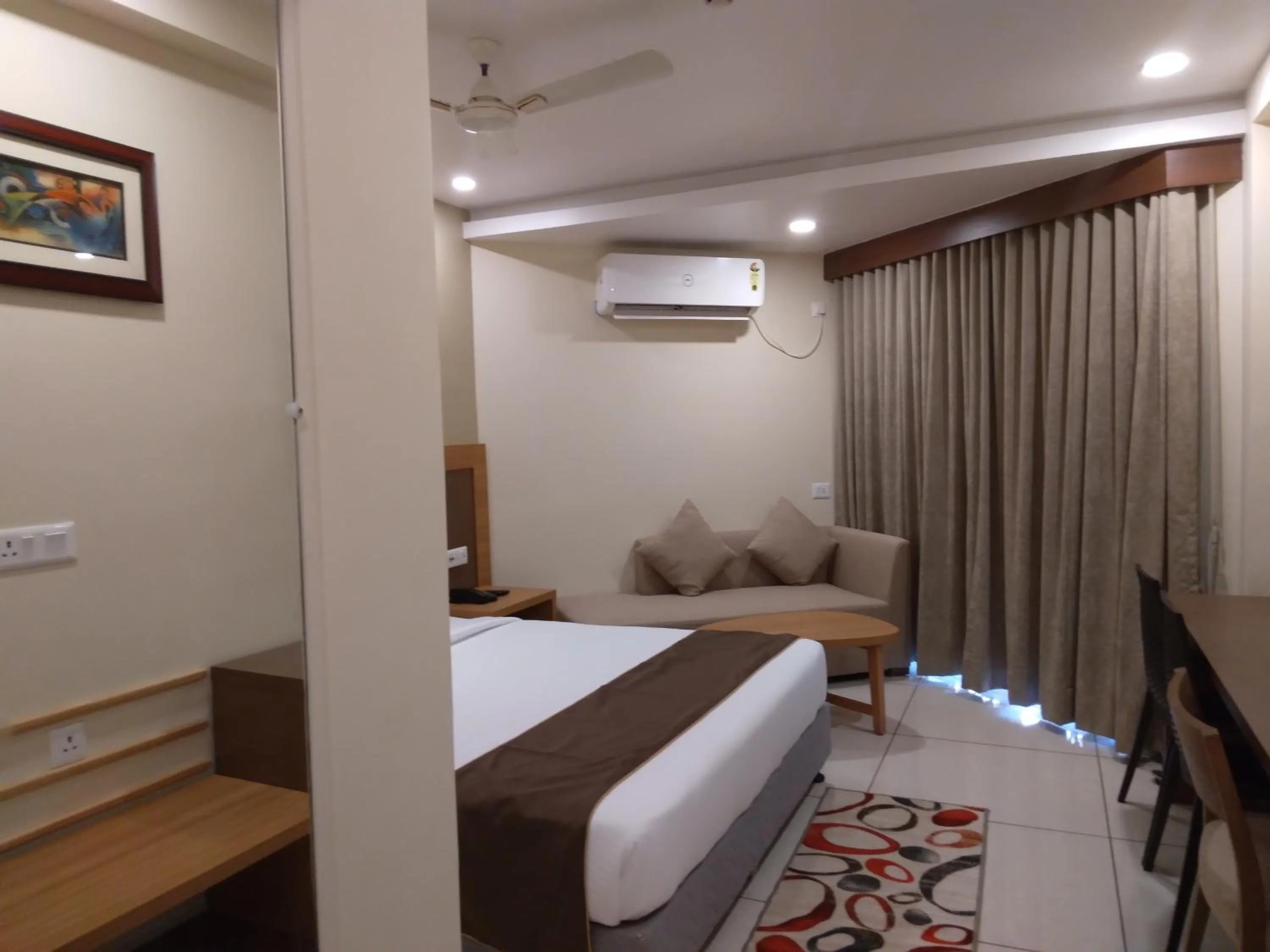 Living room, Bed in HOTEL NILADRI PREMIUM