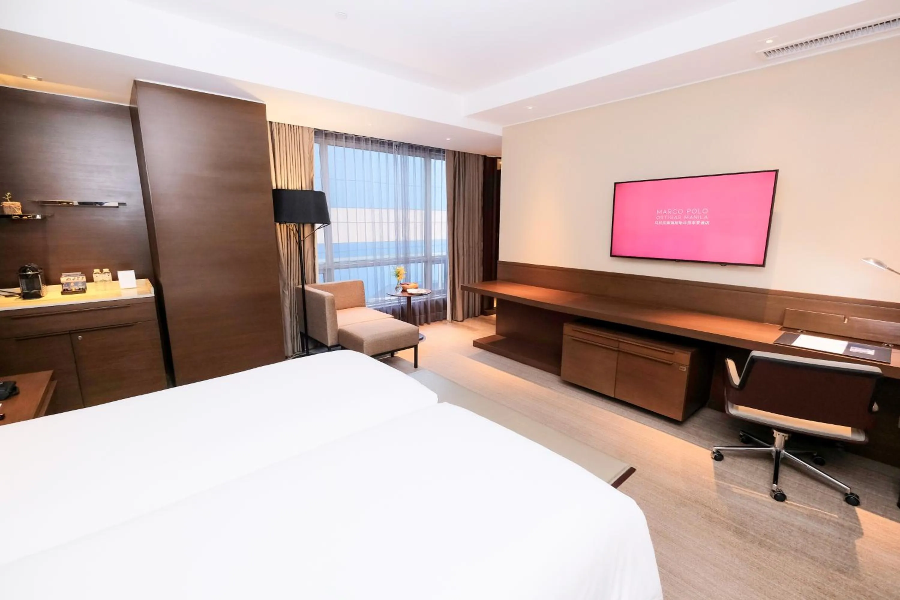 Bed in Marco Polo Ortigas Manila