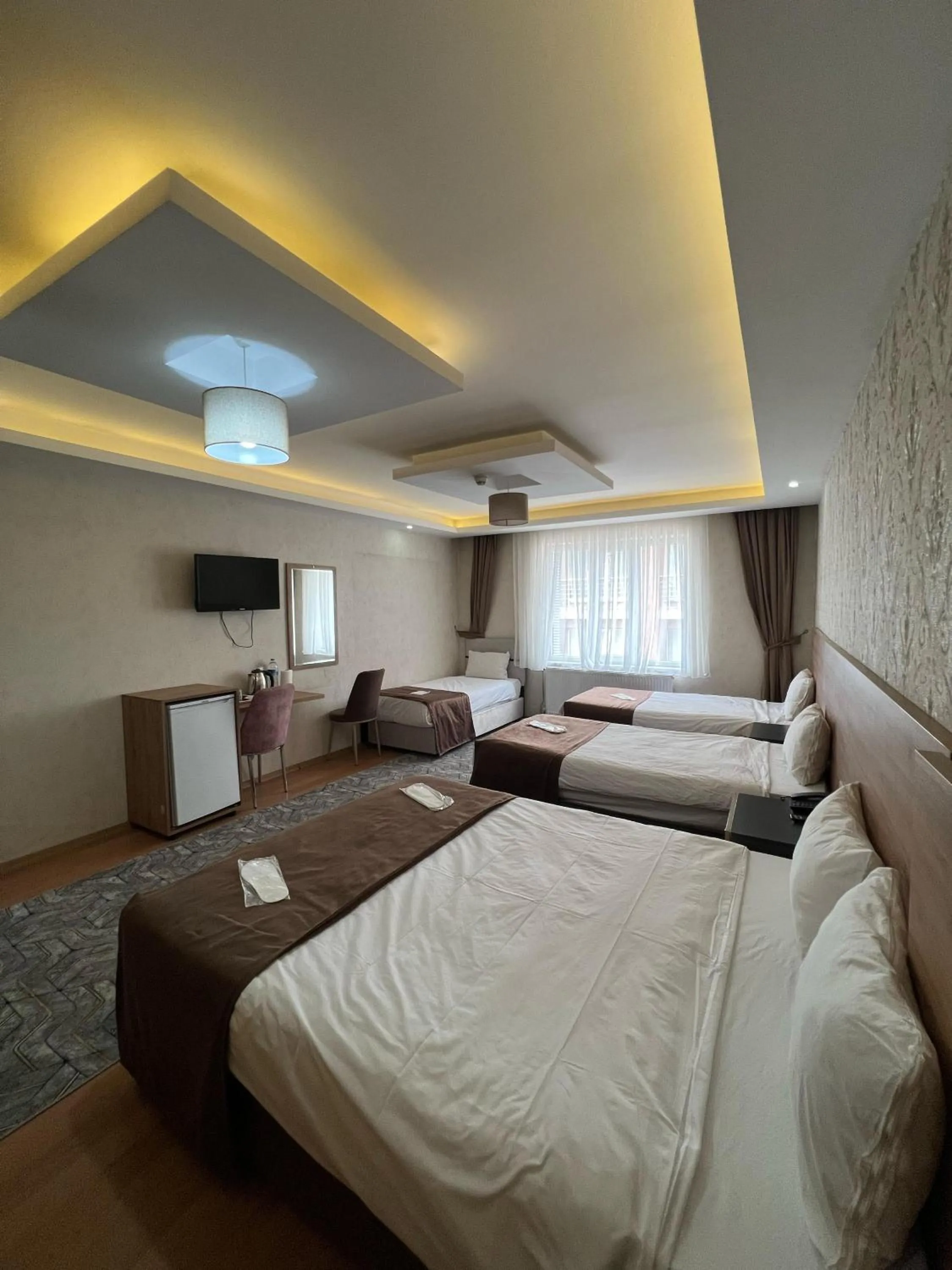 Bed in inDİANA HOTEL