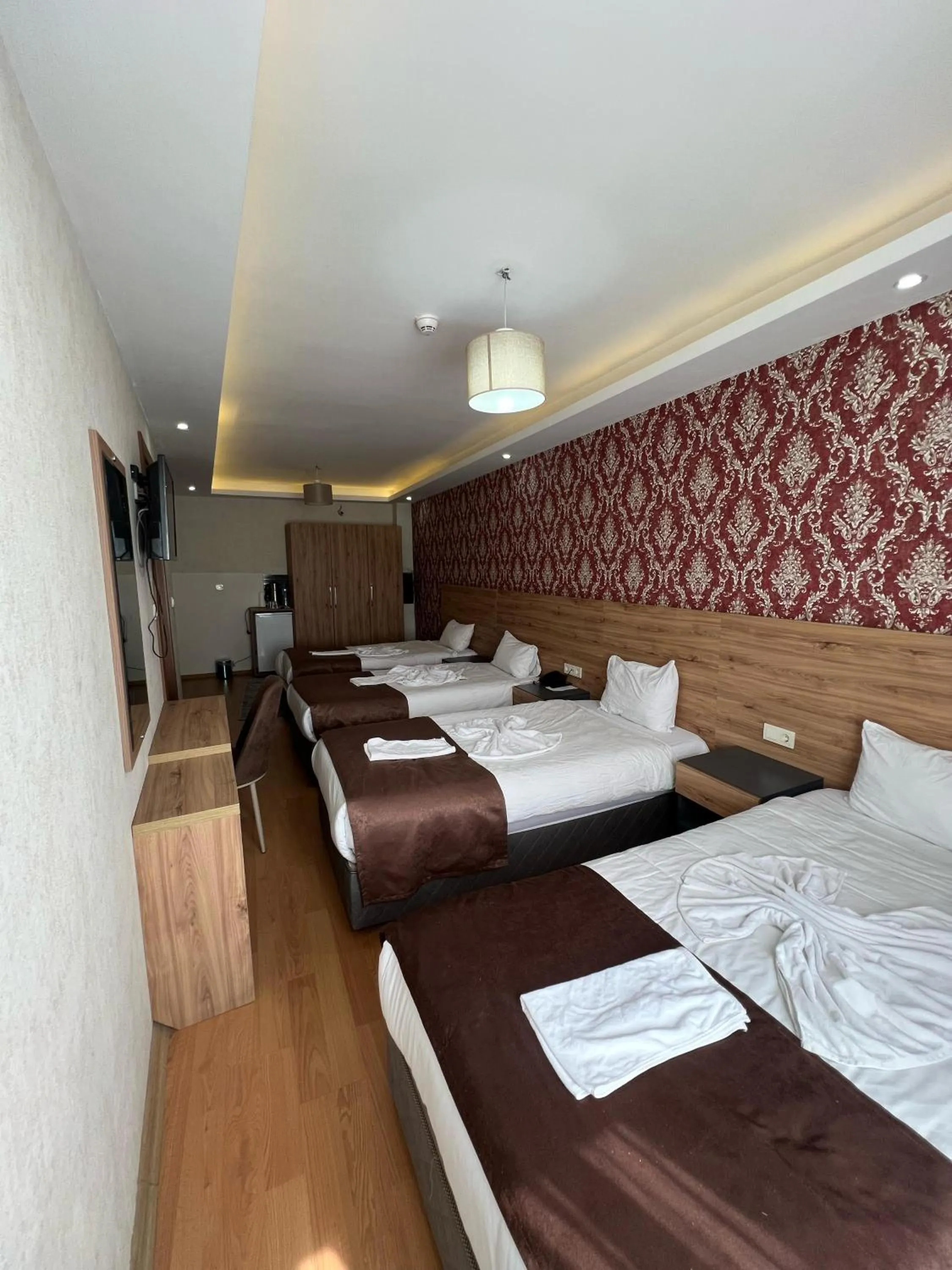 Bed in inDİANA HOTEL