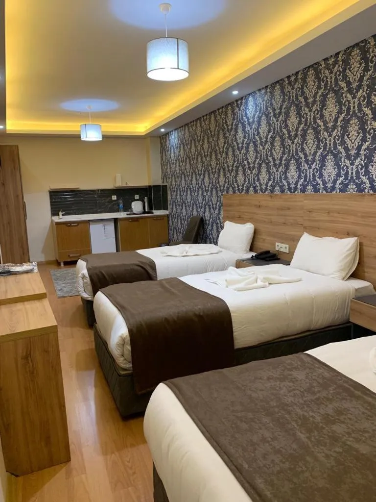 Bed in inDİANA HOTEL