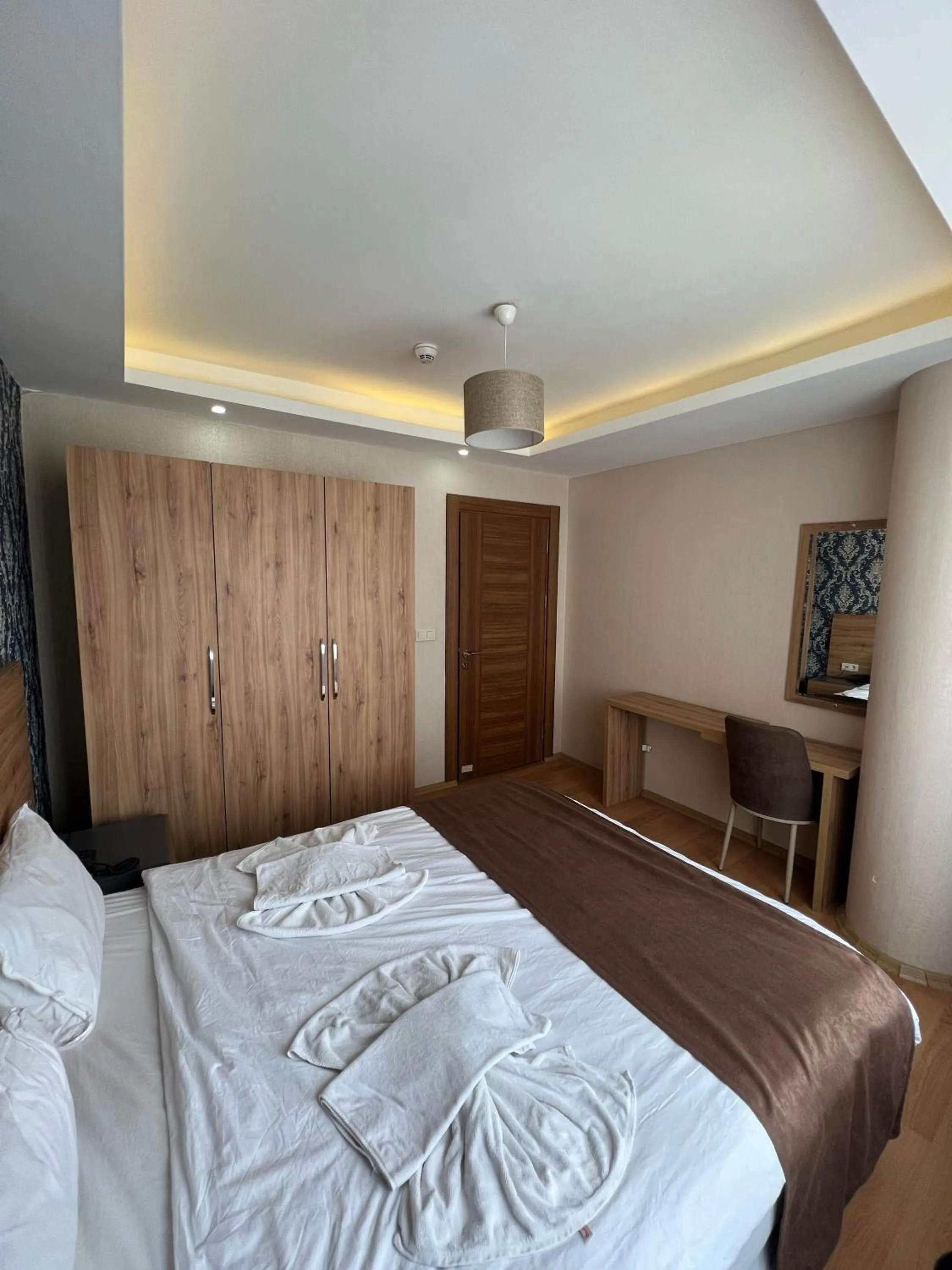 Bed in inDİANA HOTEL