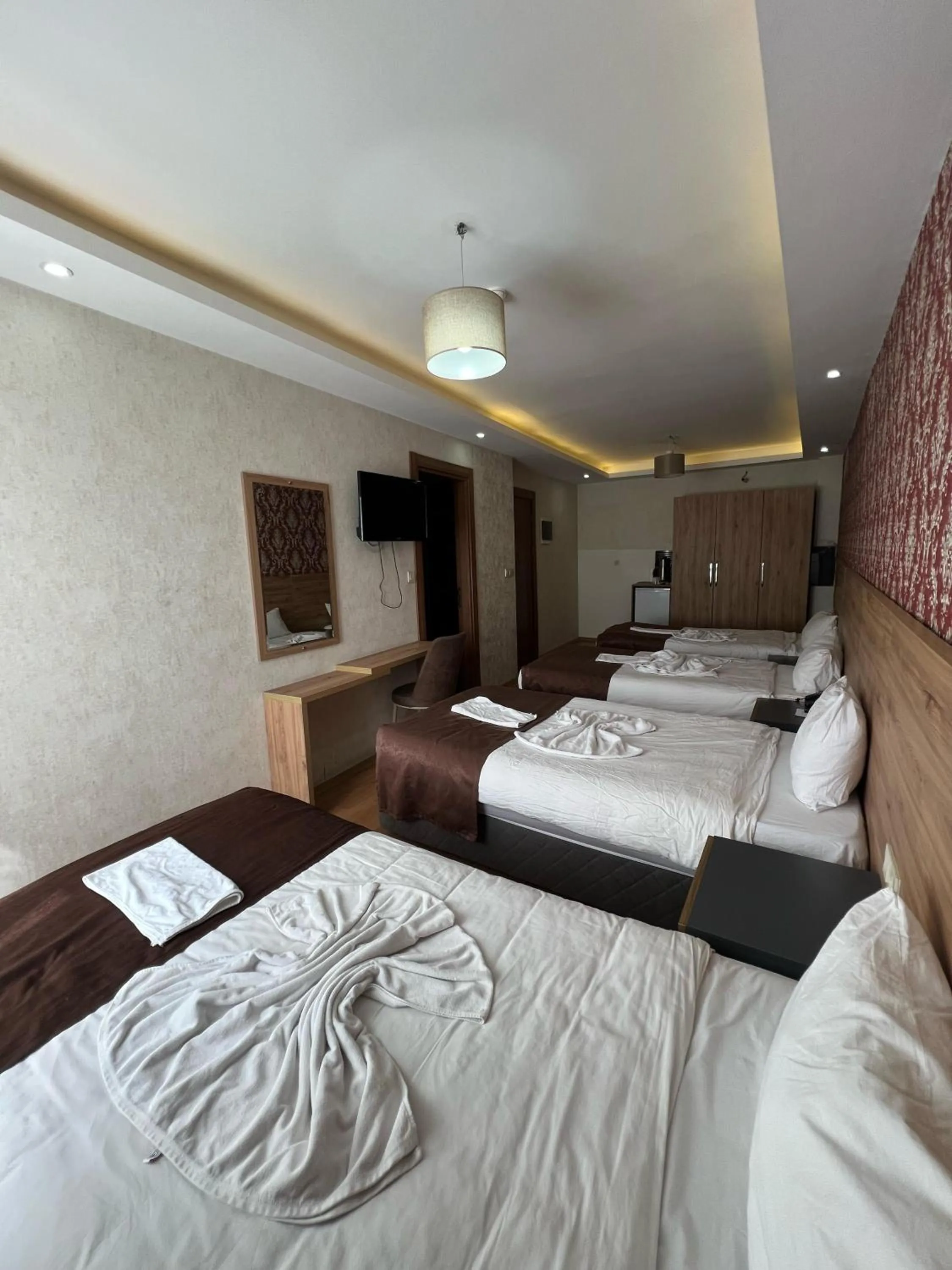 Bed in inDİANA HOTEL