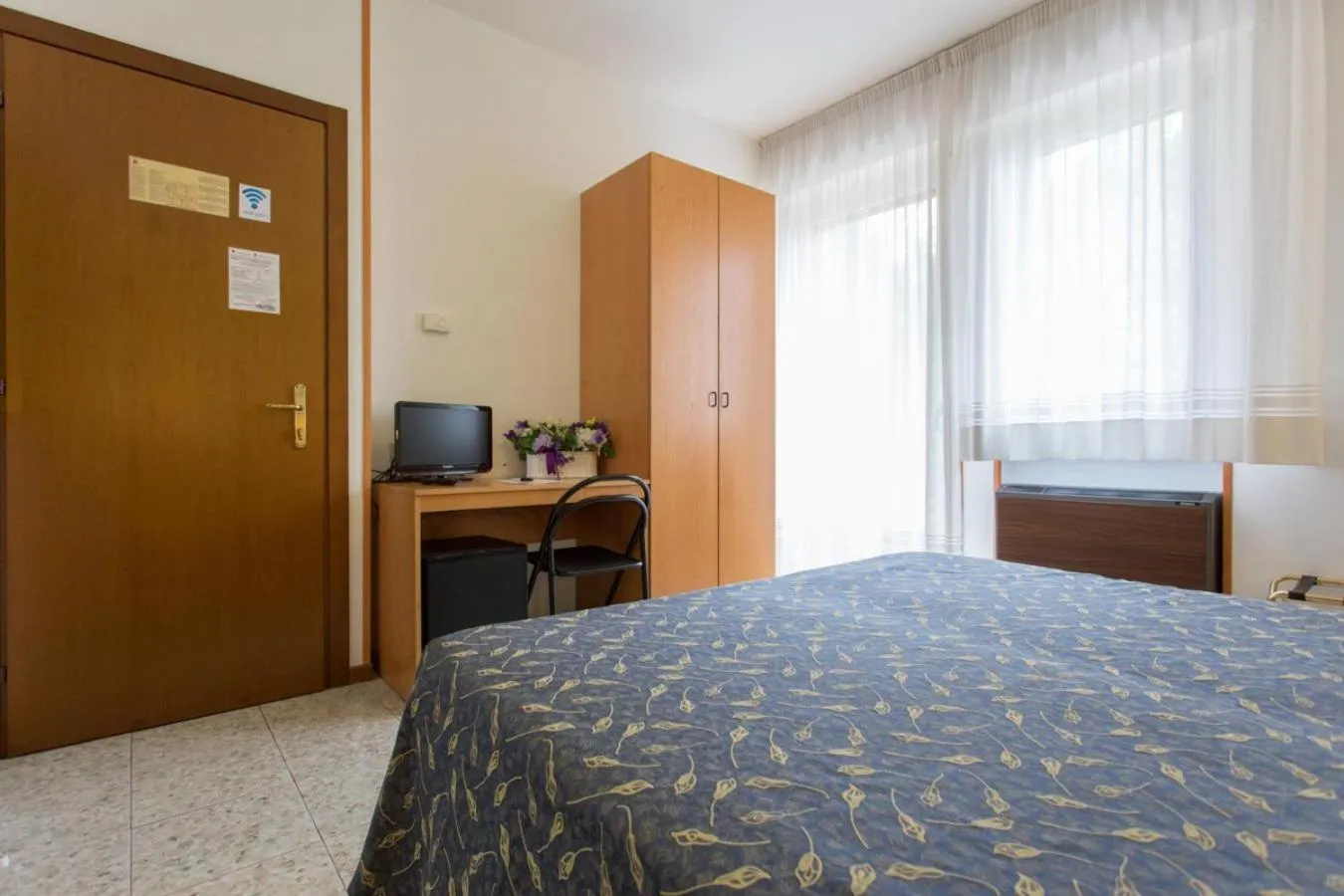 Bed in Hotel Benacus