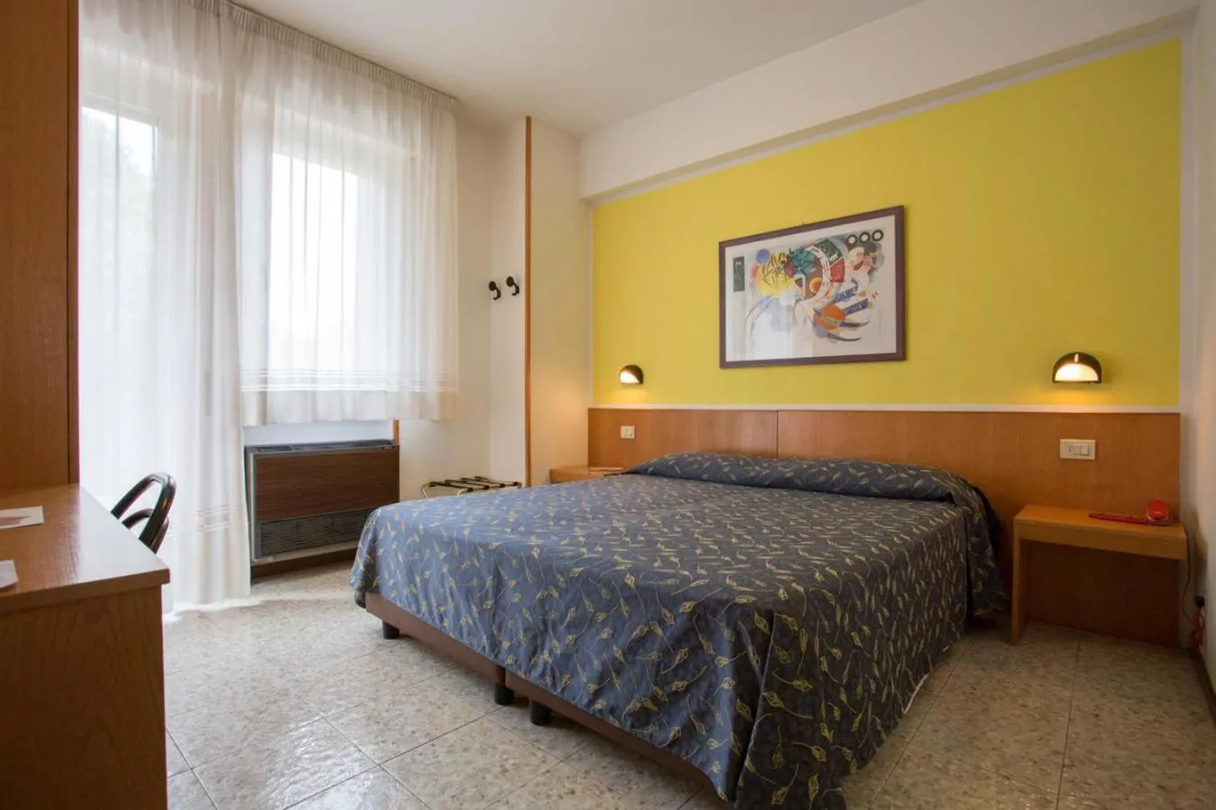 Bed in Hotel Benacus