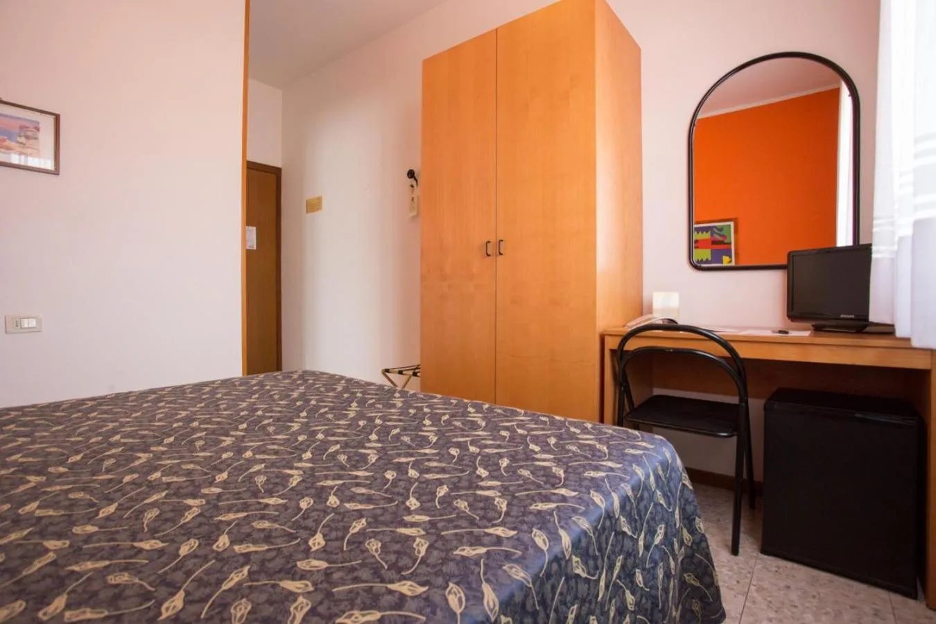 Bed in Hotel Benacus