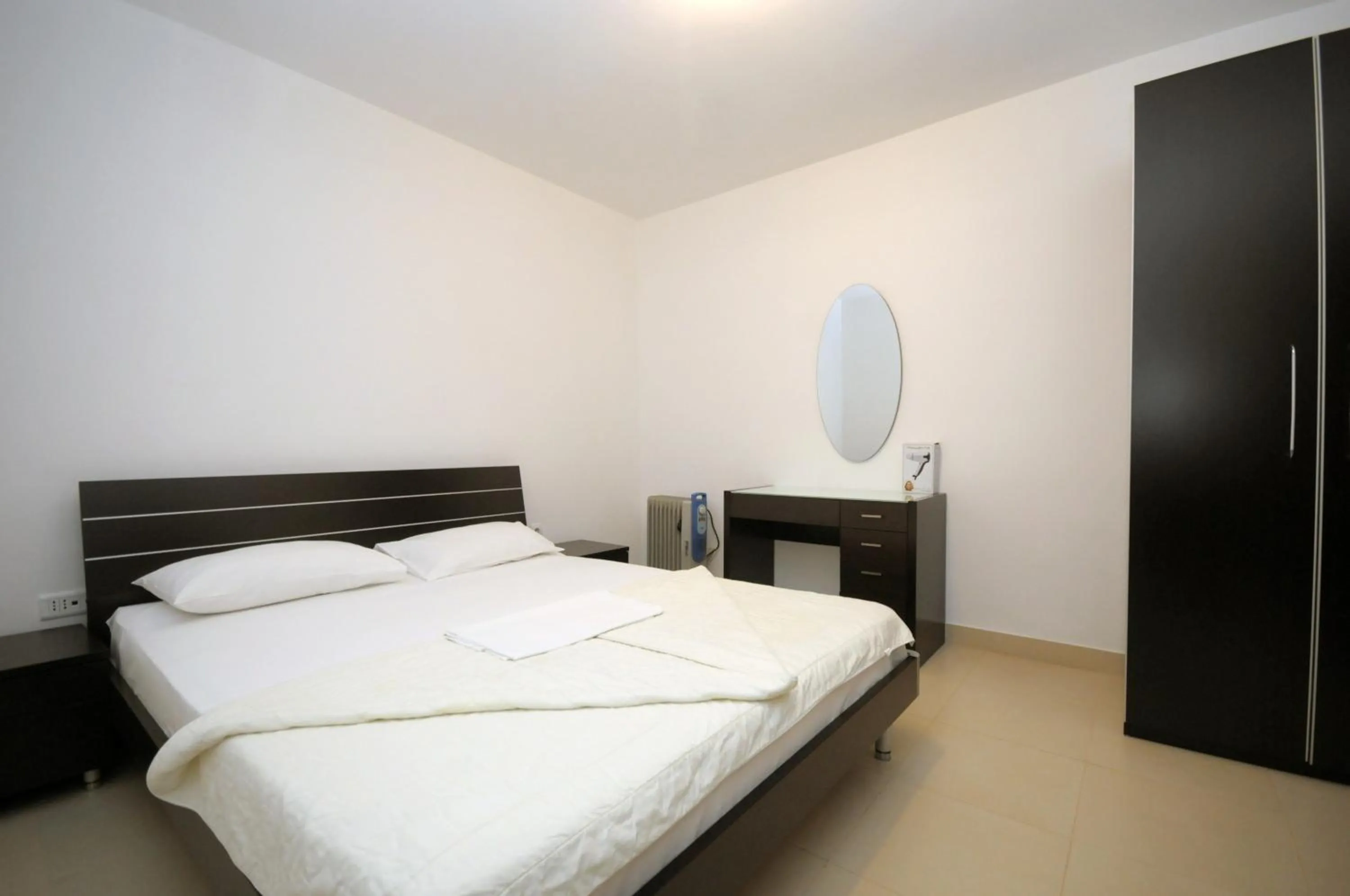 Bed in Apartments Anita