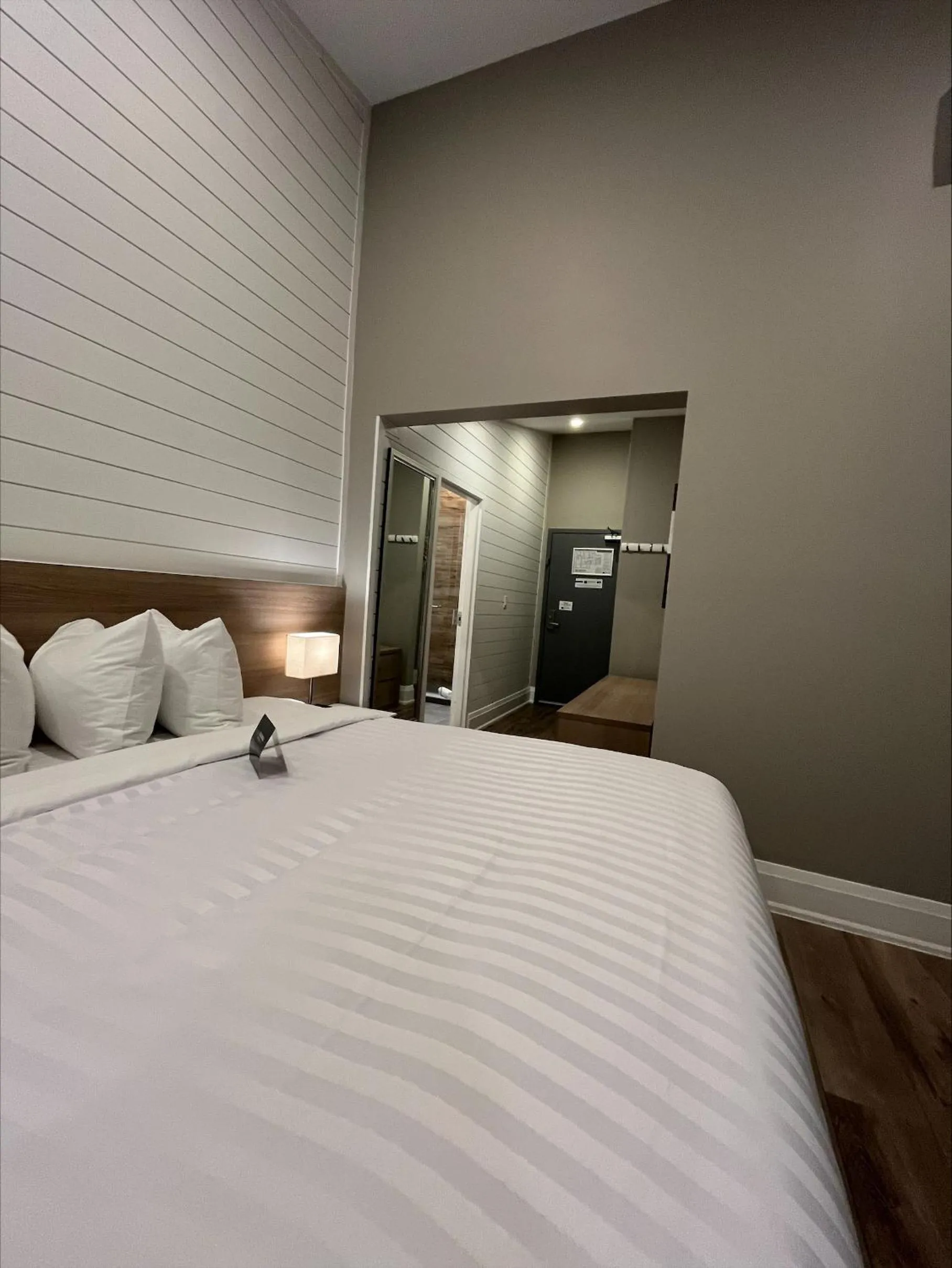 Bed in Colonial Hotel & Suites