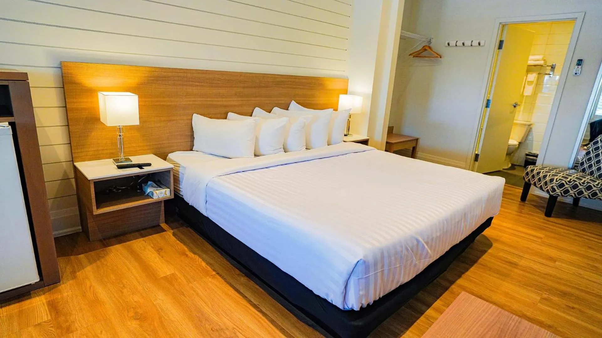 Bed in Colonial Hotel & Suites