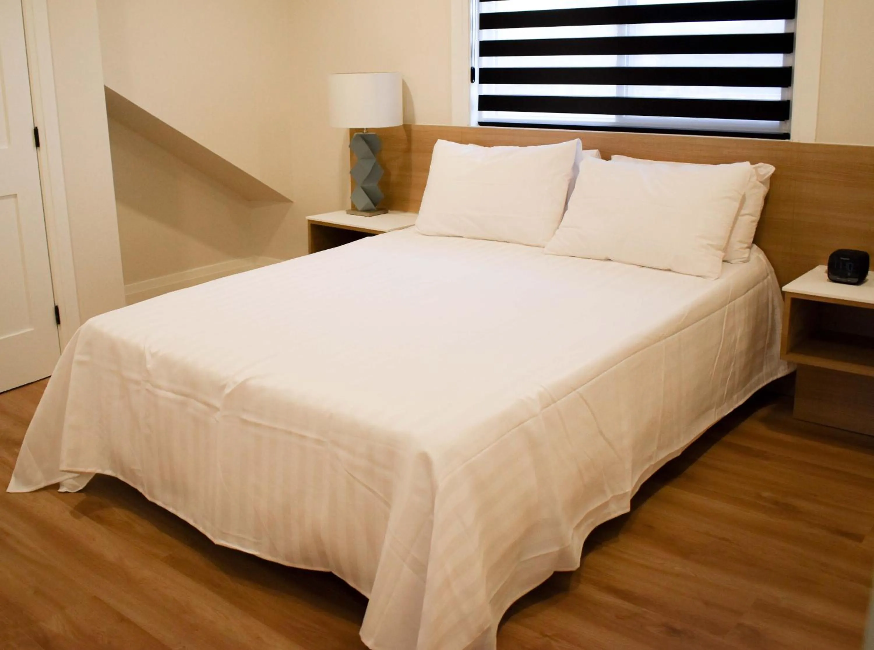 Four-Bedroom House in Colonial Hotel & Suites