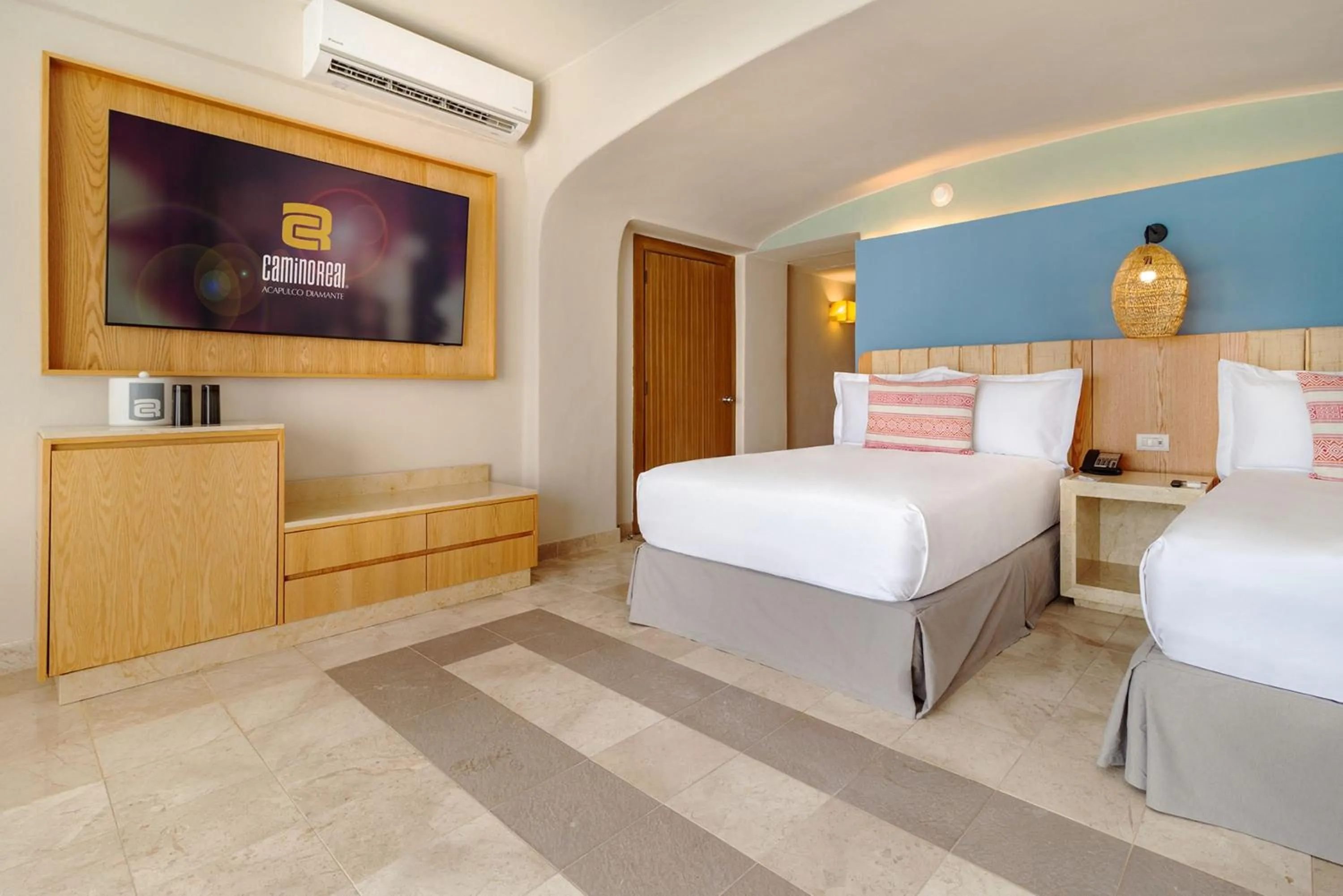 Photo of the whole room, Bed in Camino Real Acapulco Diamante