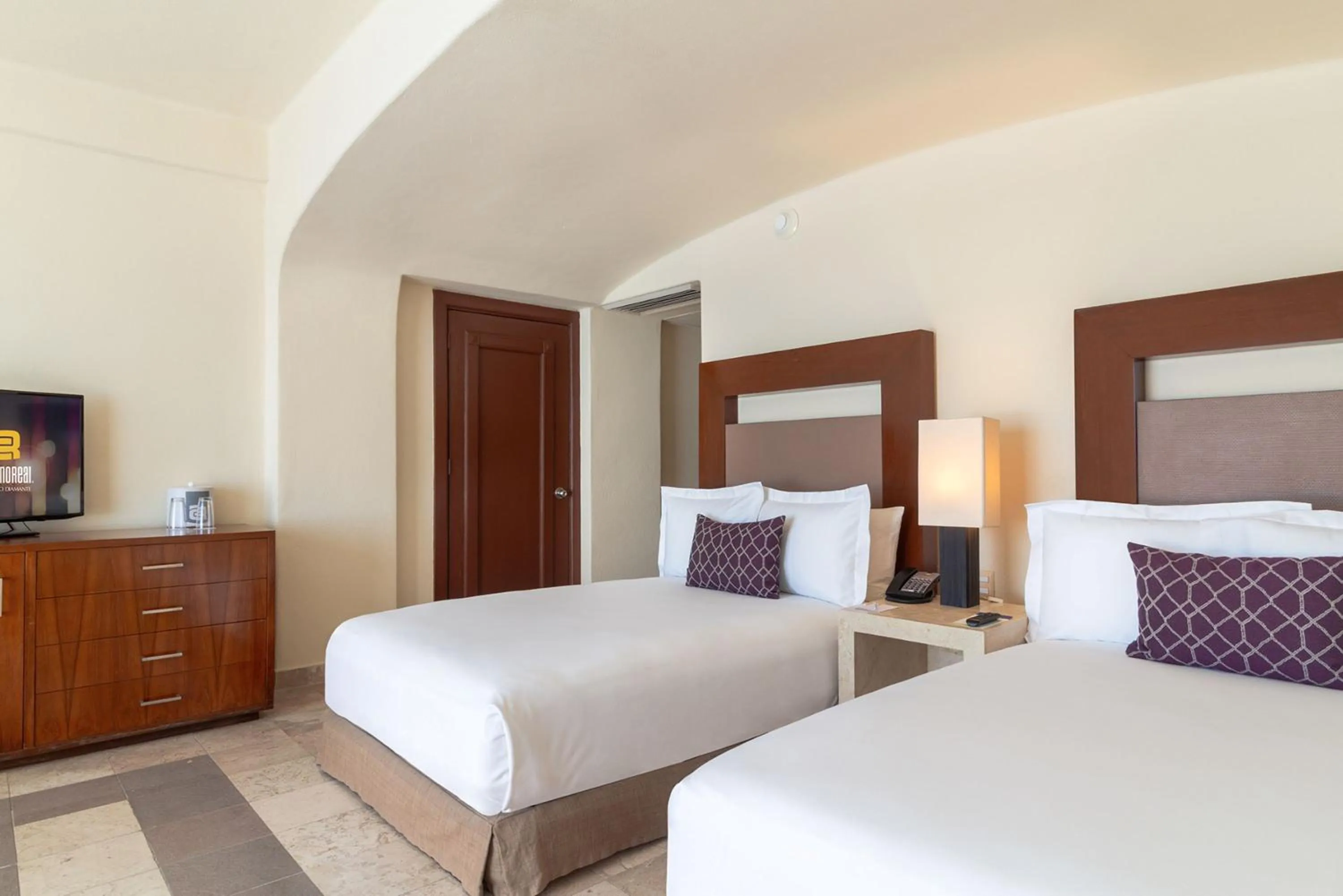 Photo of the whole room, Bed in Camino Real Acapulco Diamante