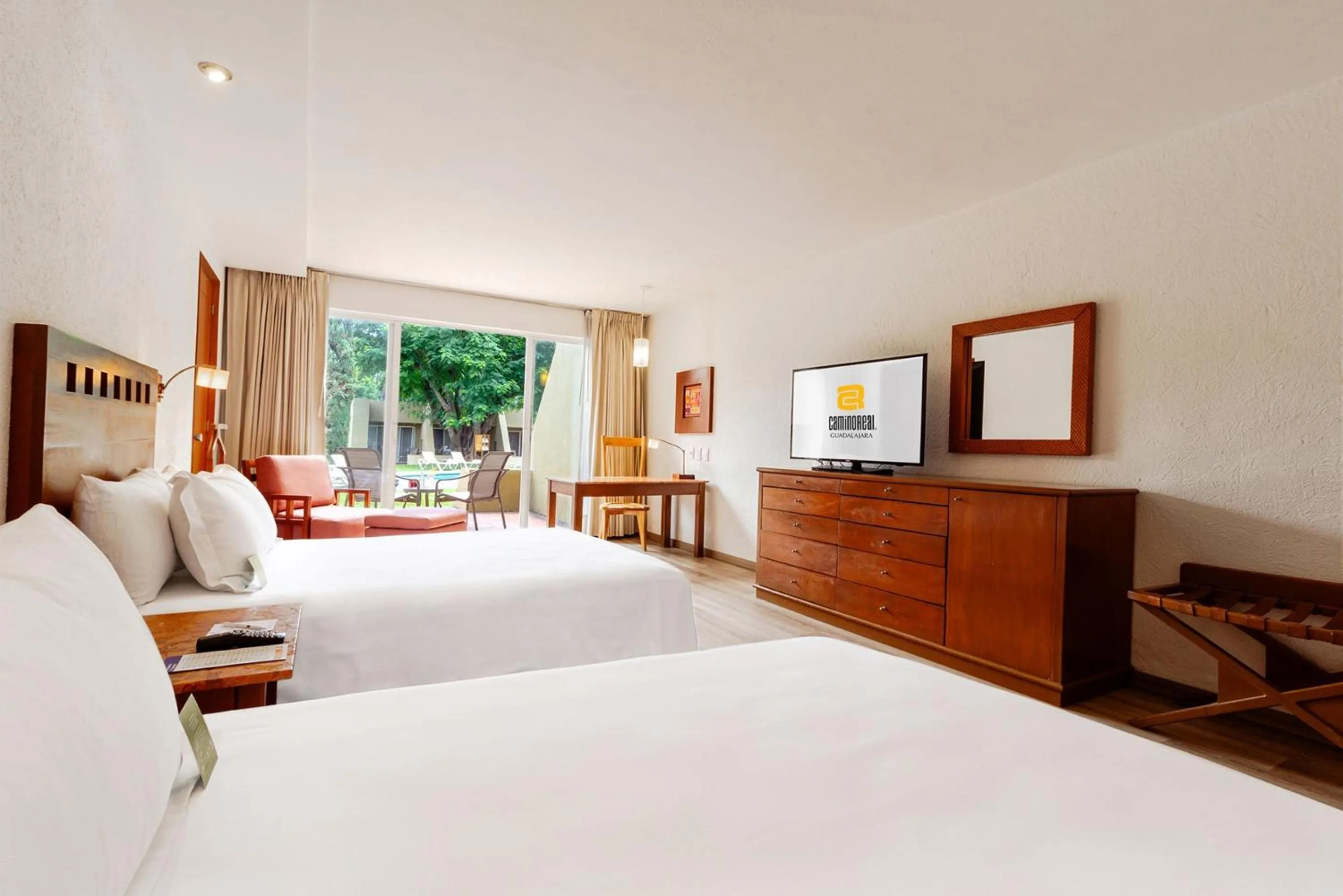 Photo of the whole room, Bed in Camino Real Guadalajara