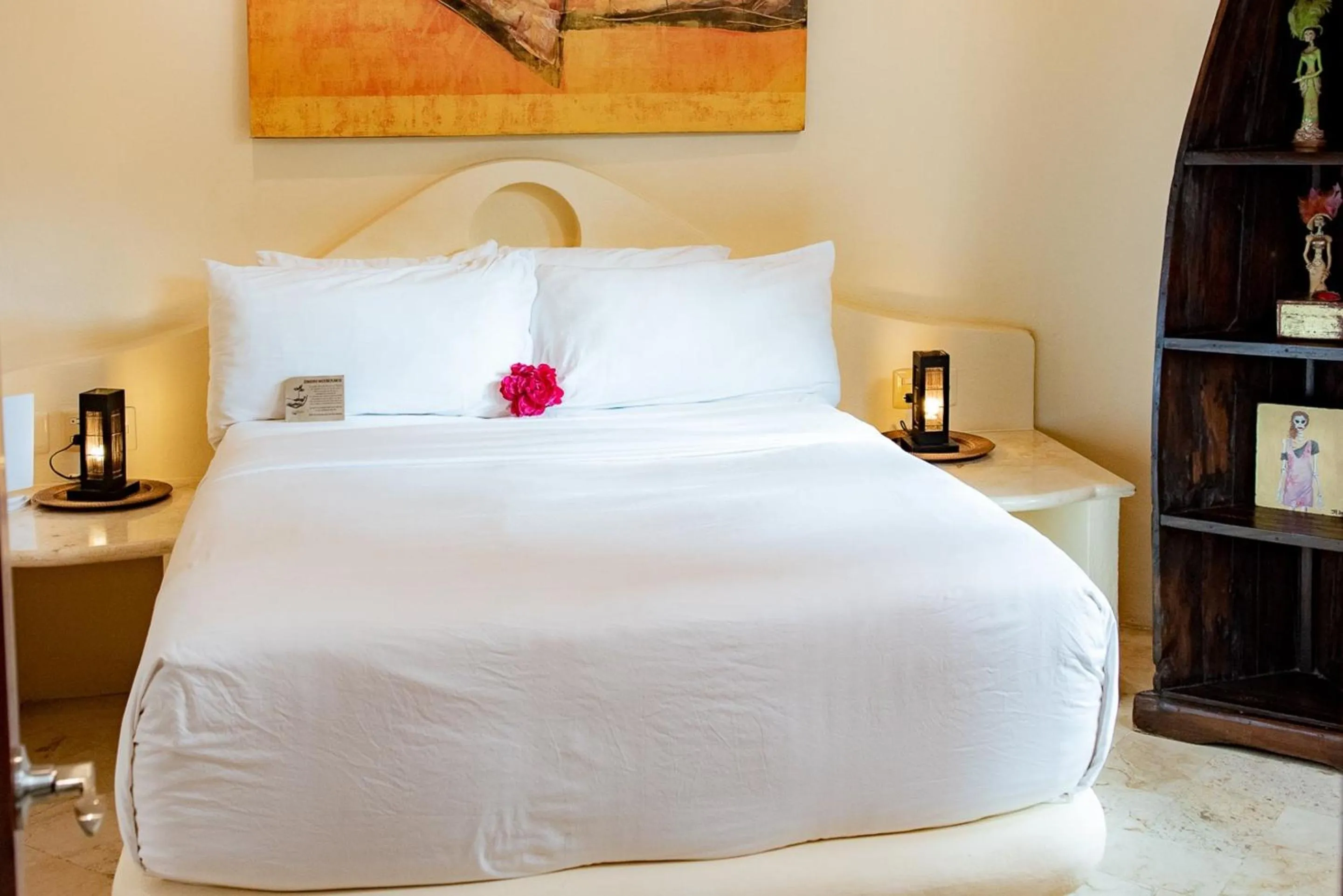 Bed in Villas Sacbe Condo Hotel and Beach Club