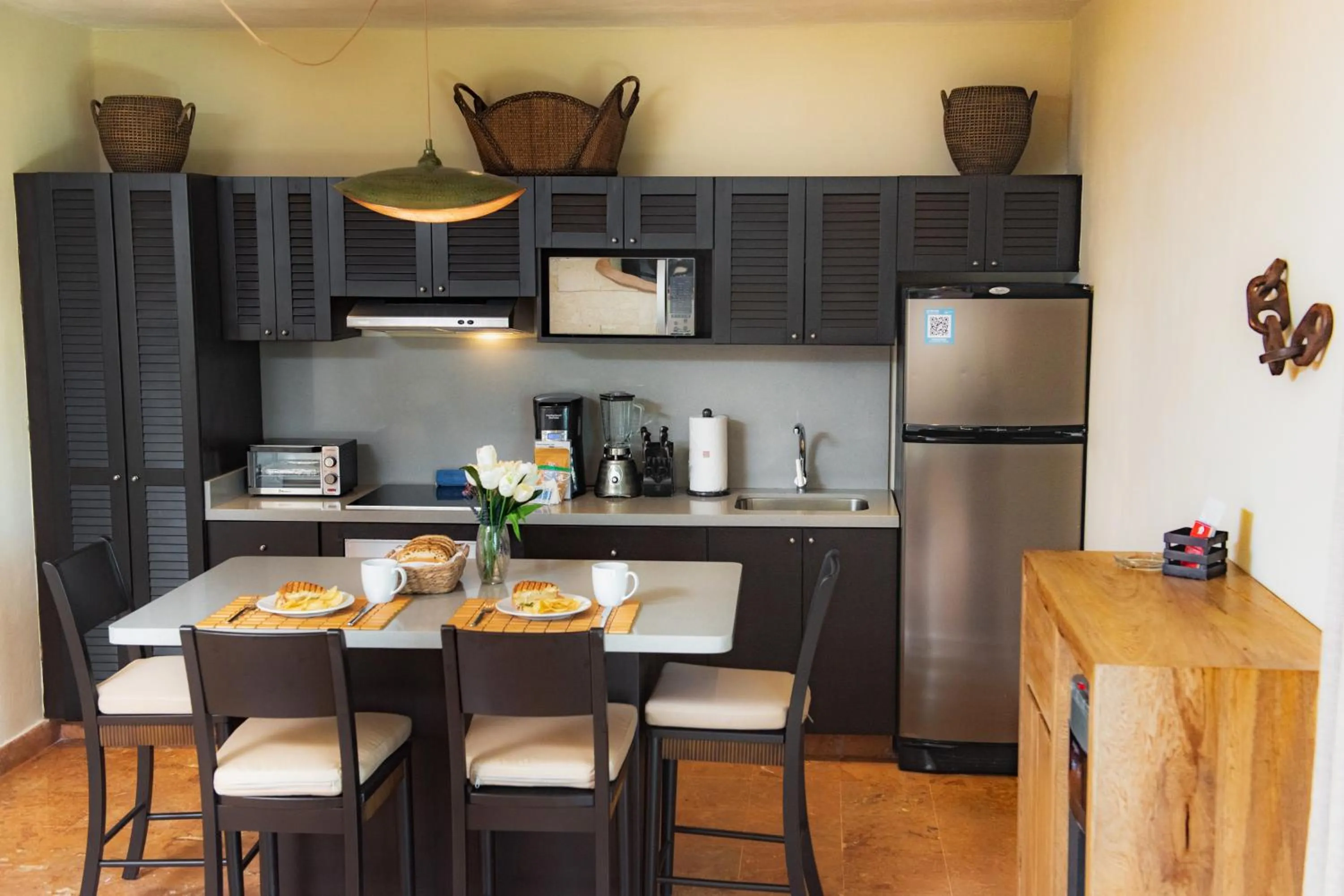 Dining area in El Taj Oceanfront and Beachside Condo Hotel
