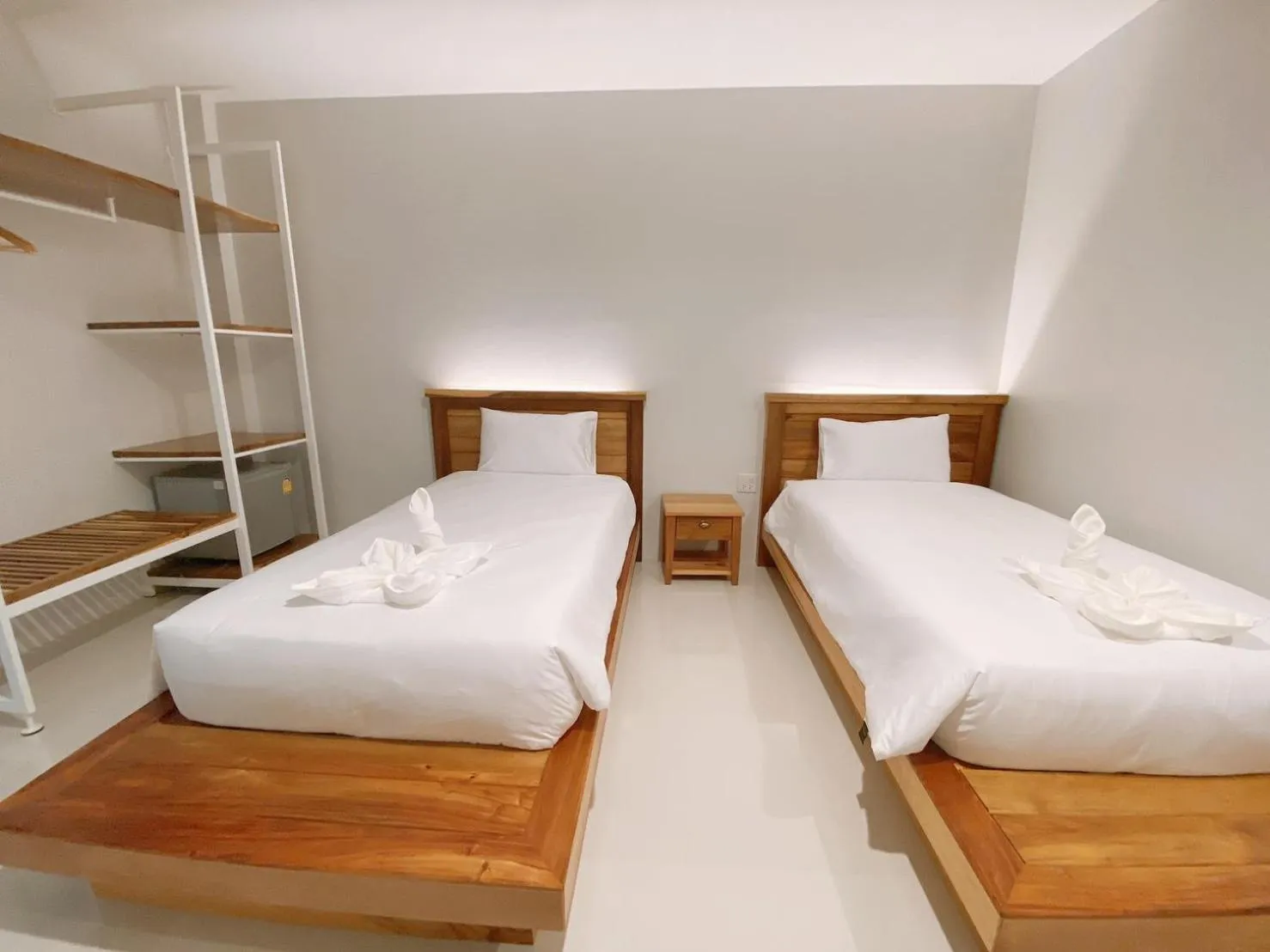 Bed in Greenish Hotel