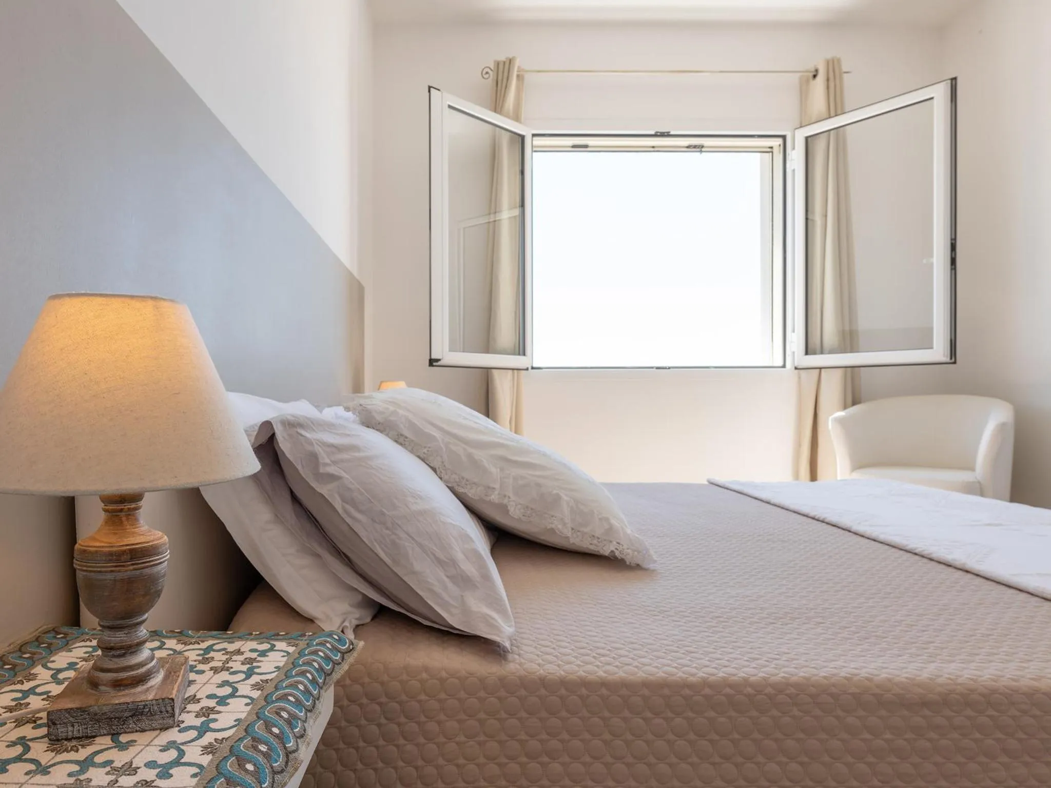 Bedroom, Bed in Panoramic Studio Carloforte