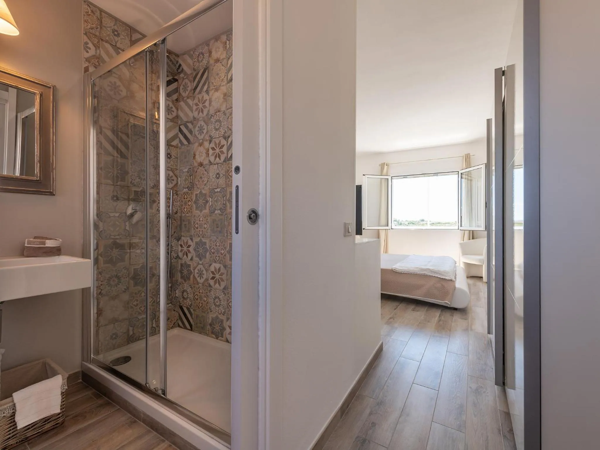 Bathroom, Bed in Panoramic Studio Carloforte