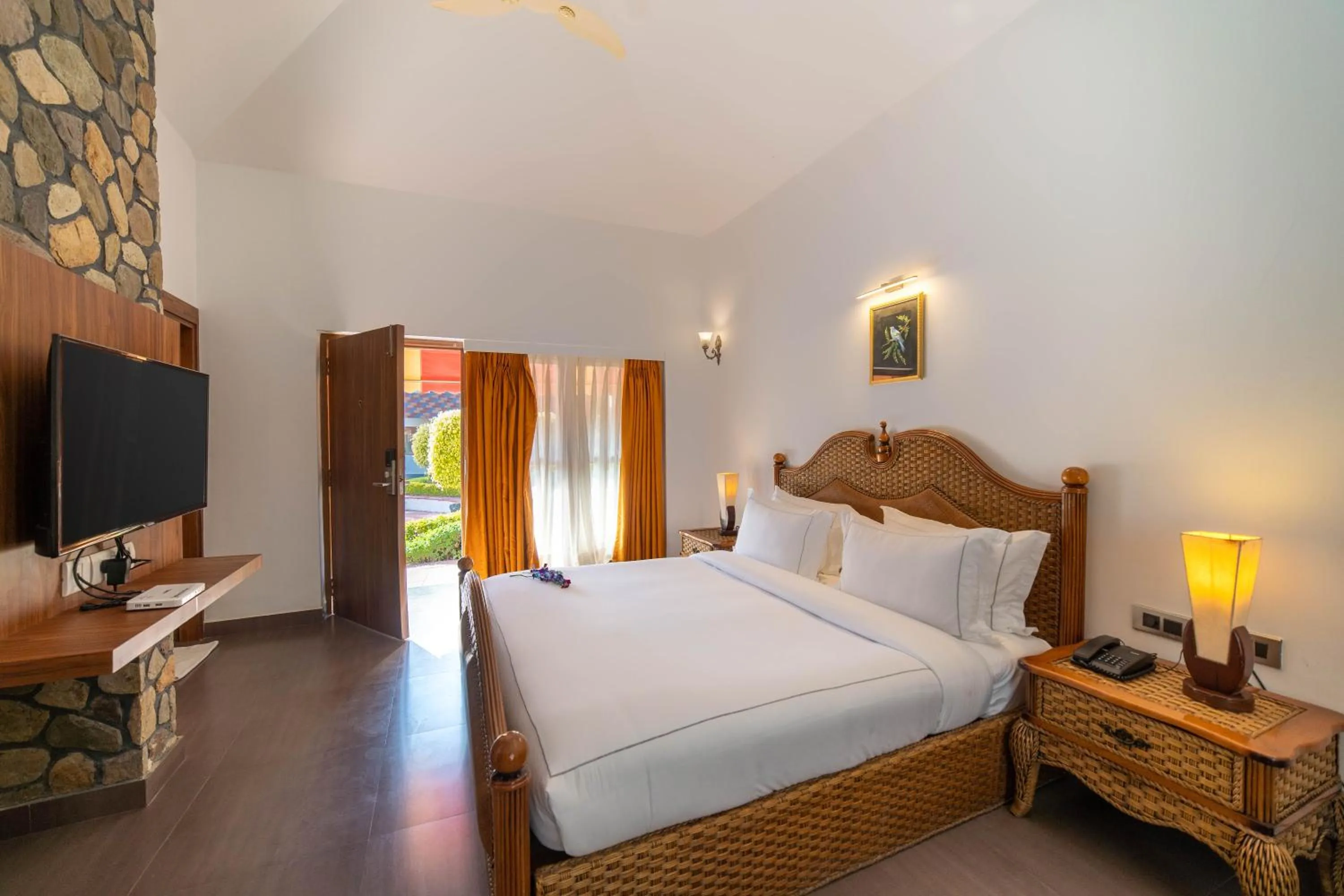 Photo of the whole room, Bed in Country Inn Tarika Riverside Resort Jim Corbett