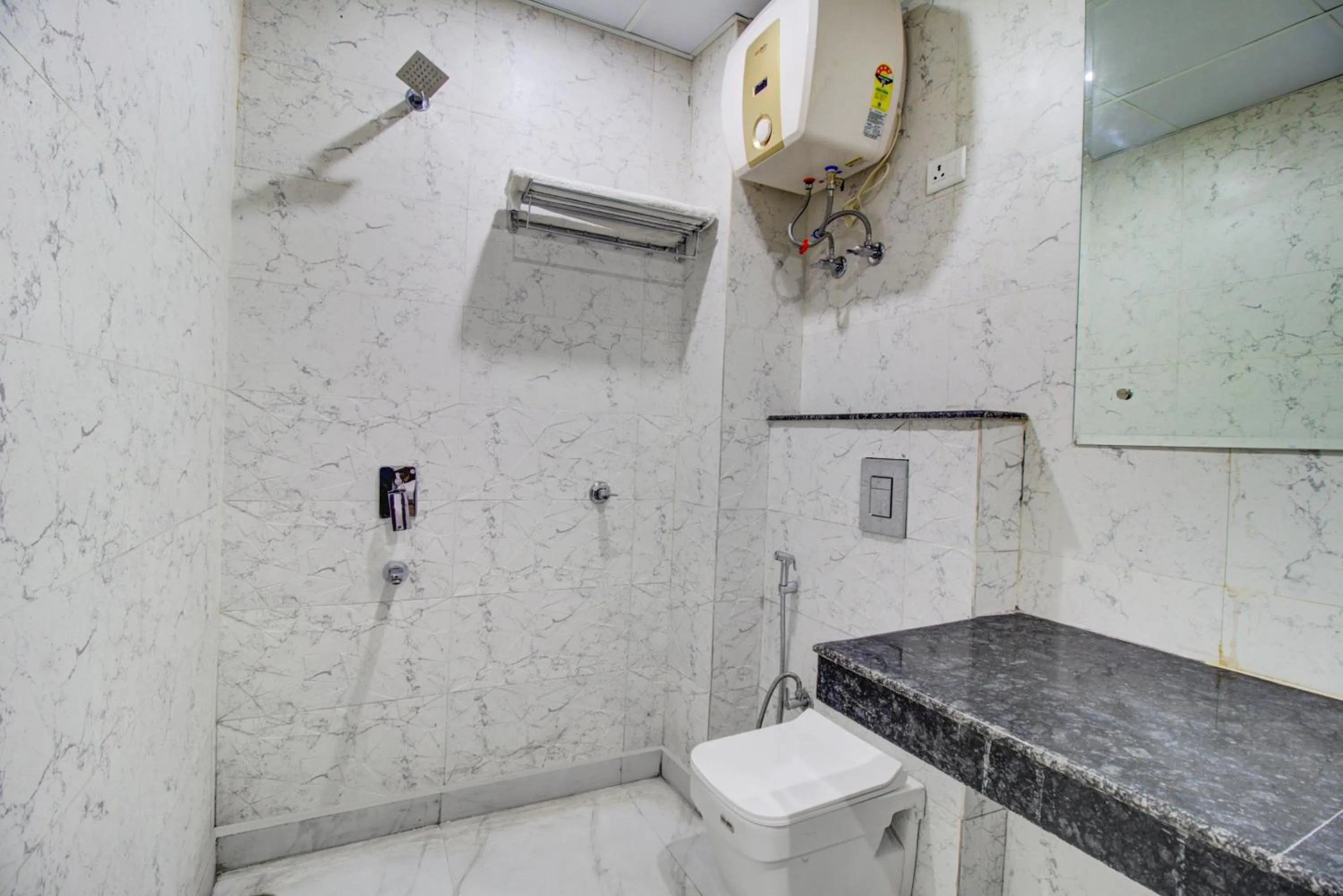 Bathroom in FabHotel Gross inn Suites - Nr IGI Airport New Delhi