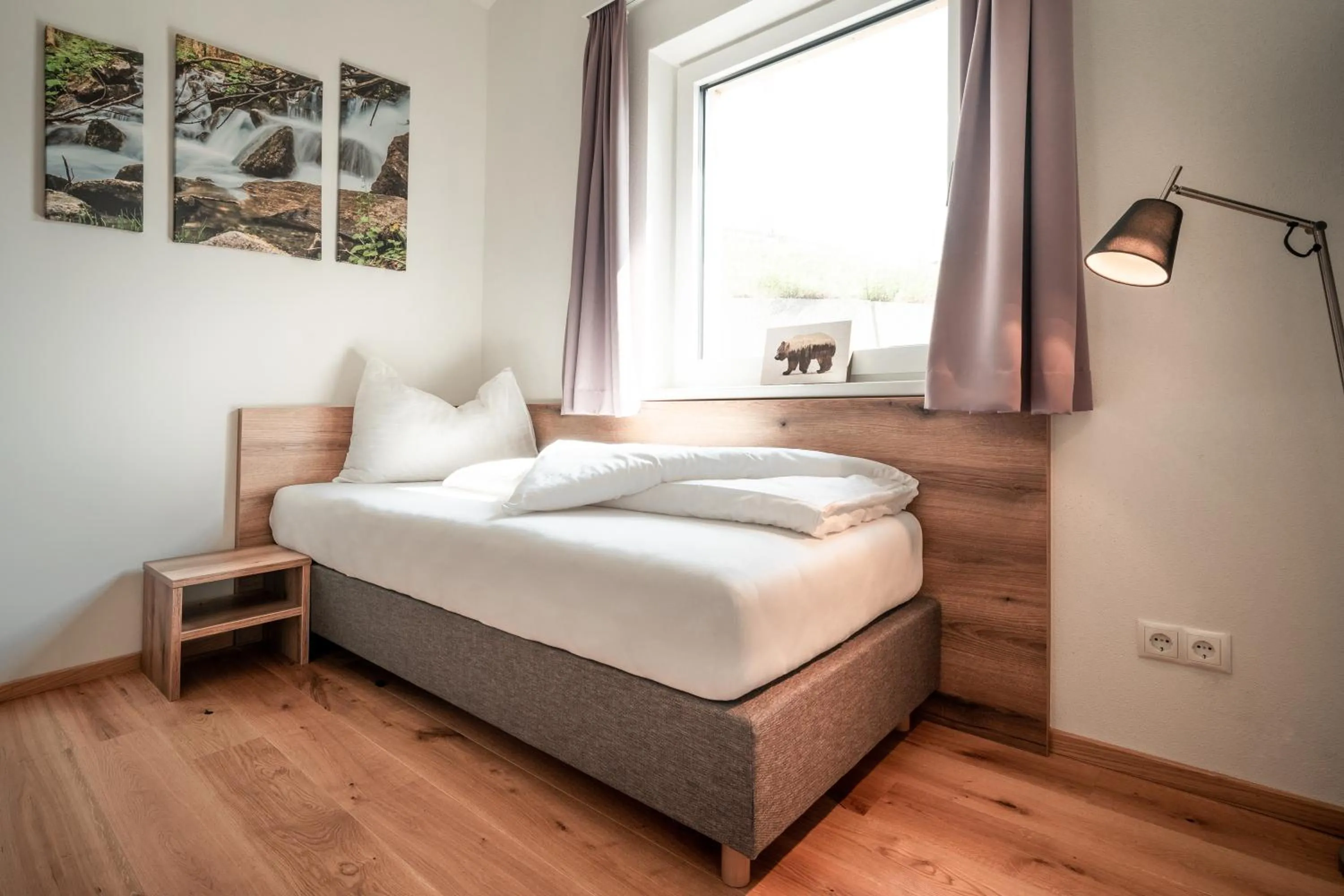 Bed in Sun Side by Schladming-Appartements