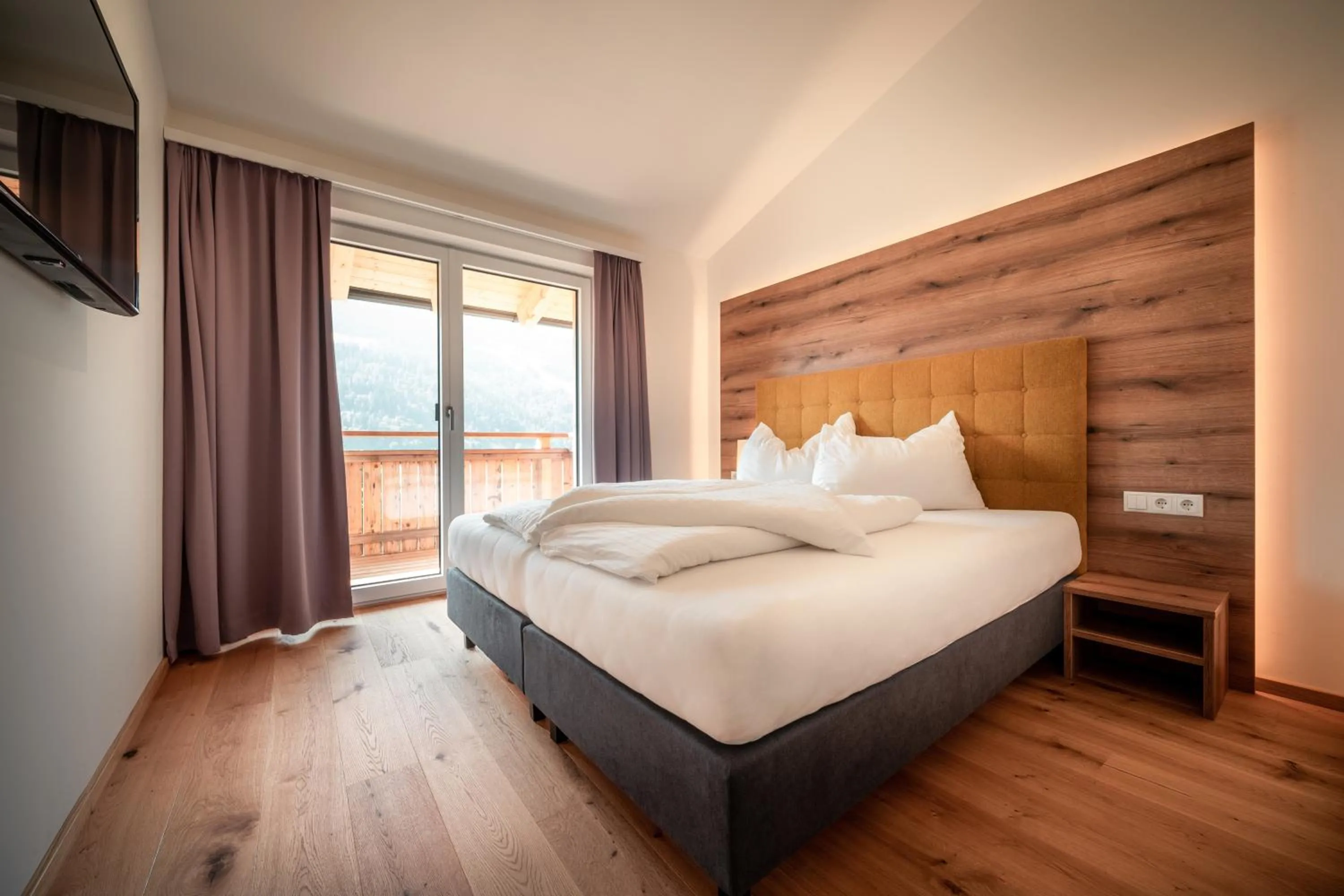 Bed in Sun Side by Schladming-Appartements