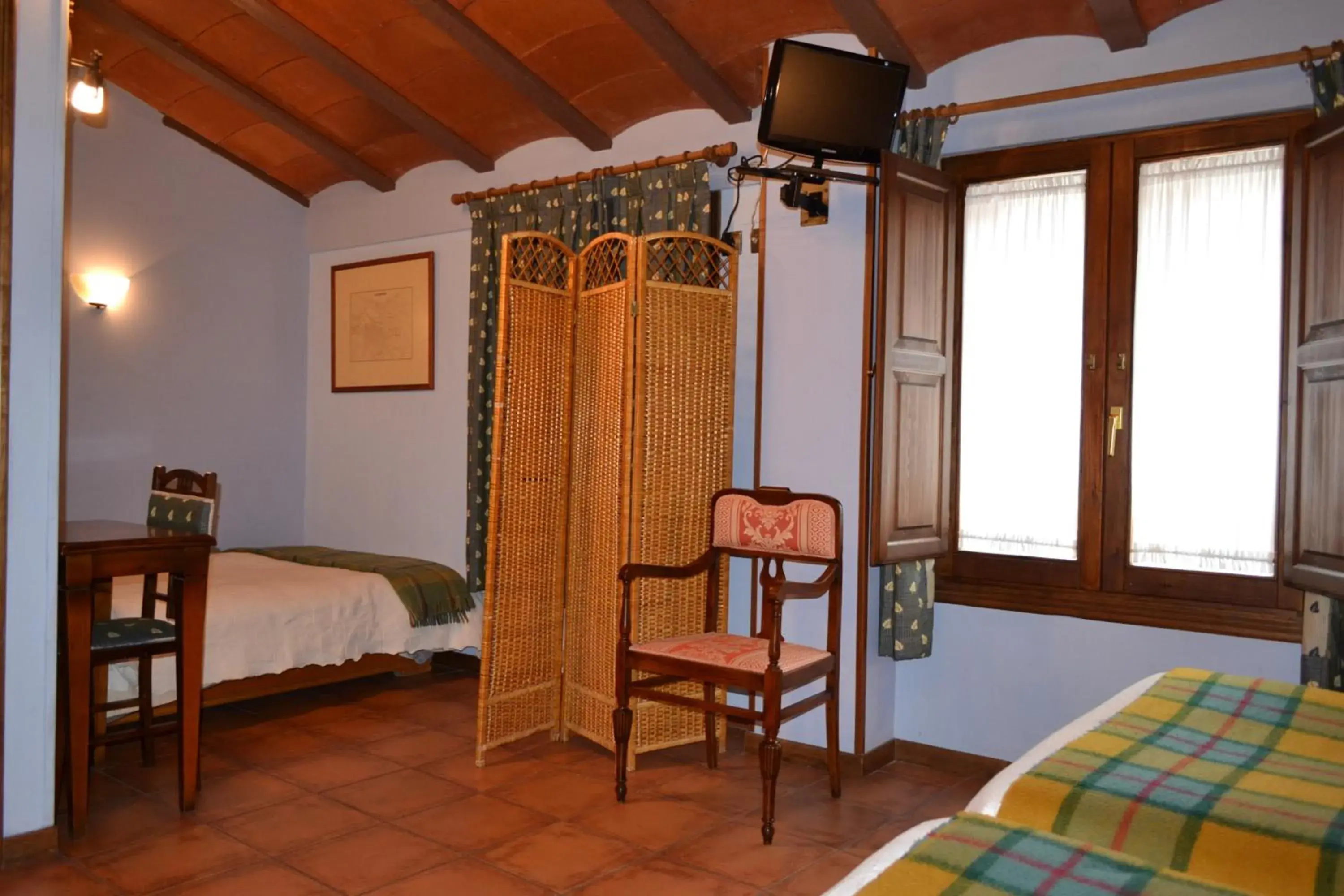 Quadruple Room in Hostal Santa Agueda Quadruple Room in Hostal Santa Agueda