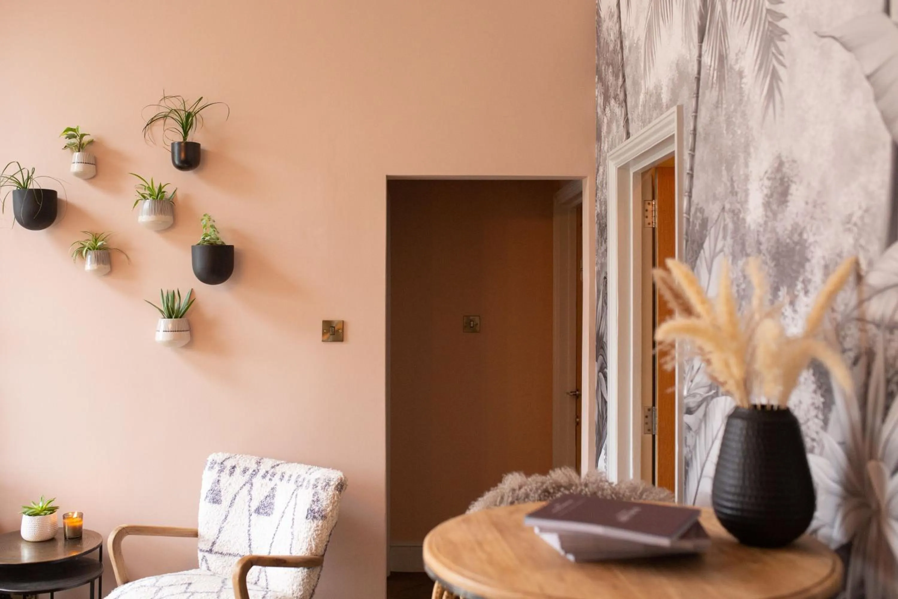 Communal lounge/ TV room in The Railway Hotel by Barefoot Retreats