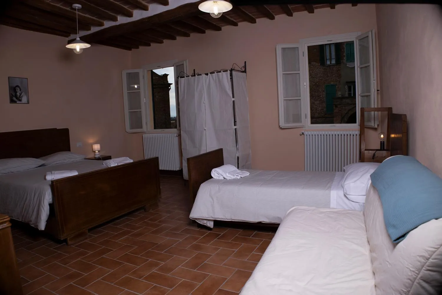 Photo of the whole room, Bed in In Collegiata