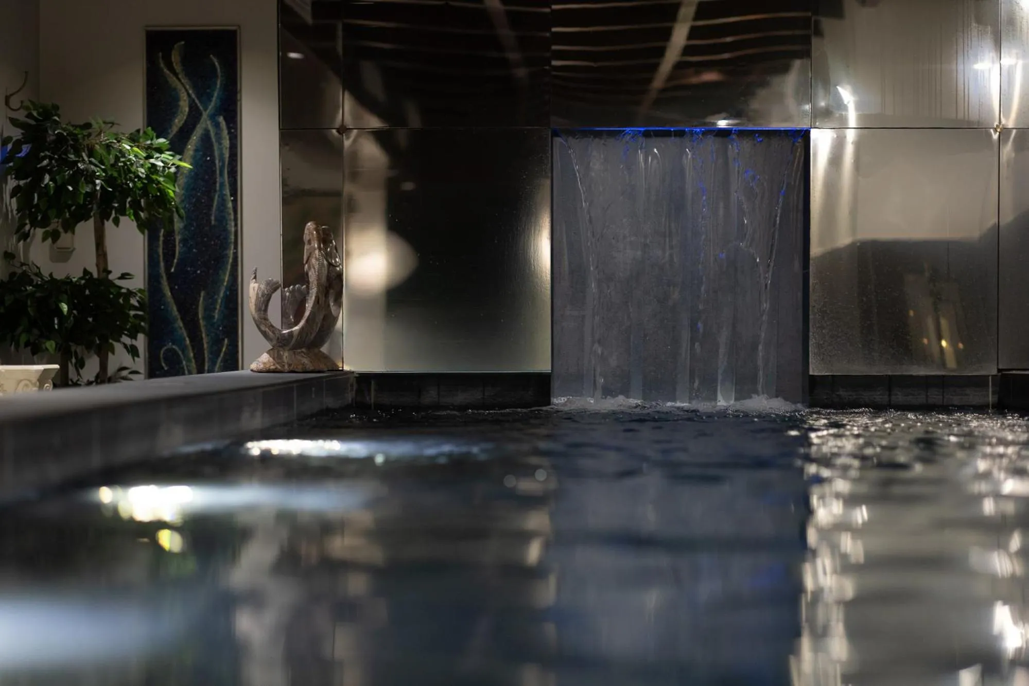 Swimming pool in Hôtel & SPA Le Chêne Vert