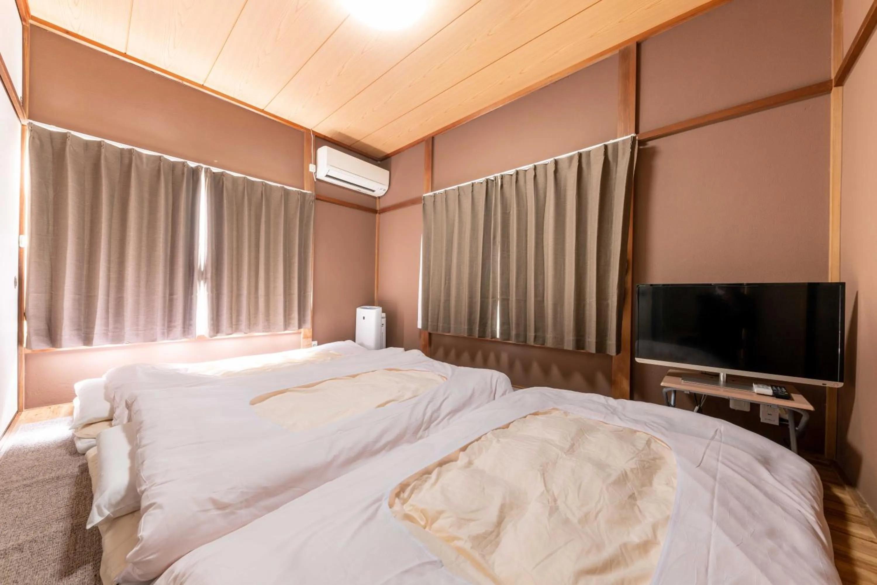 Bed in 箱根湯本 川風荘 - Hakone Yumoto Kawakazesou