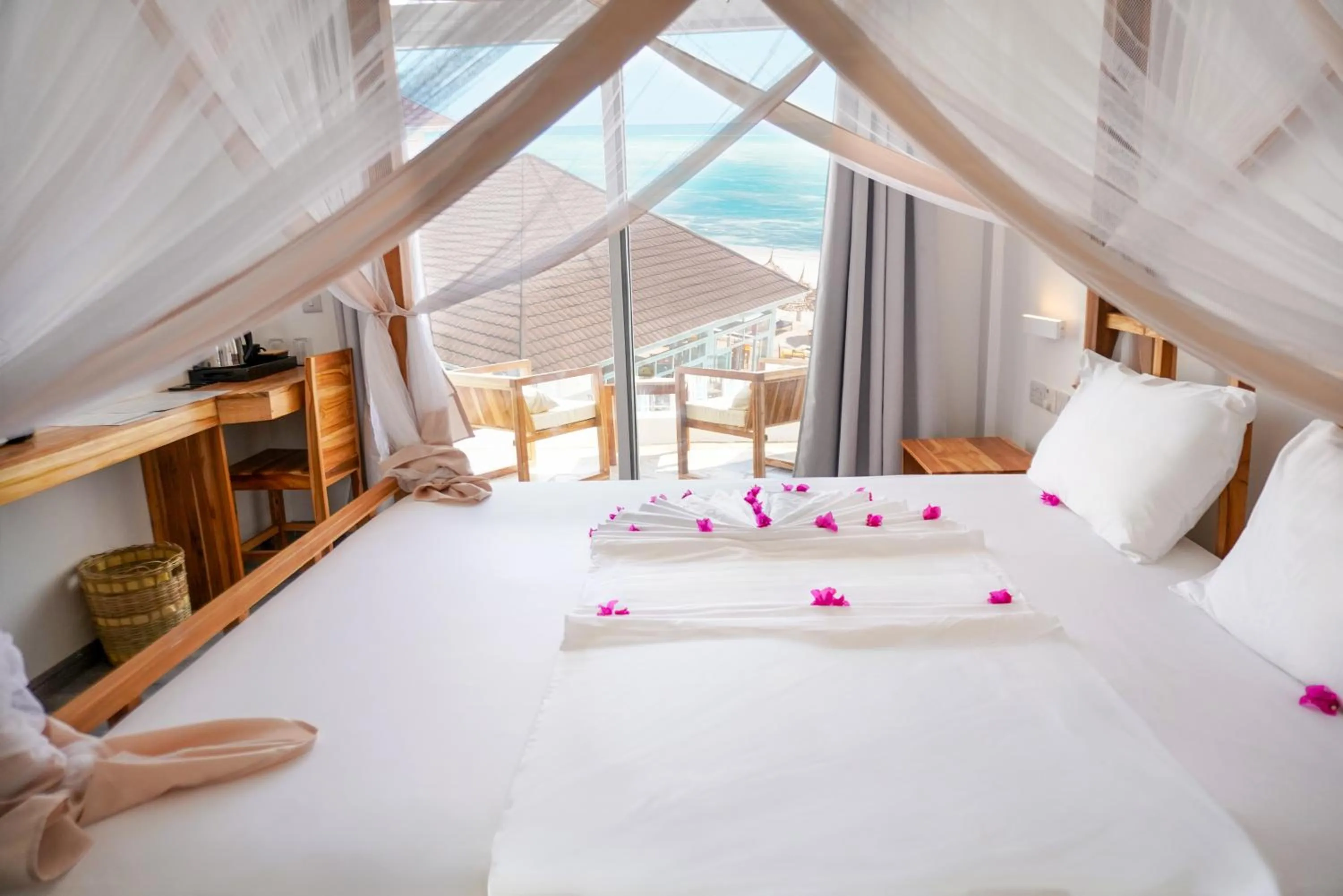 Bed in AHG Sun Bay Mlilile Beach Hotel