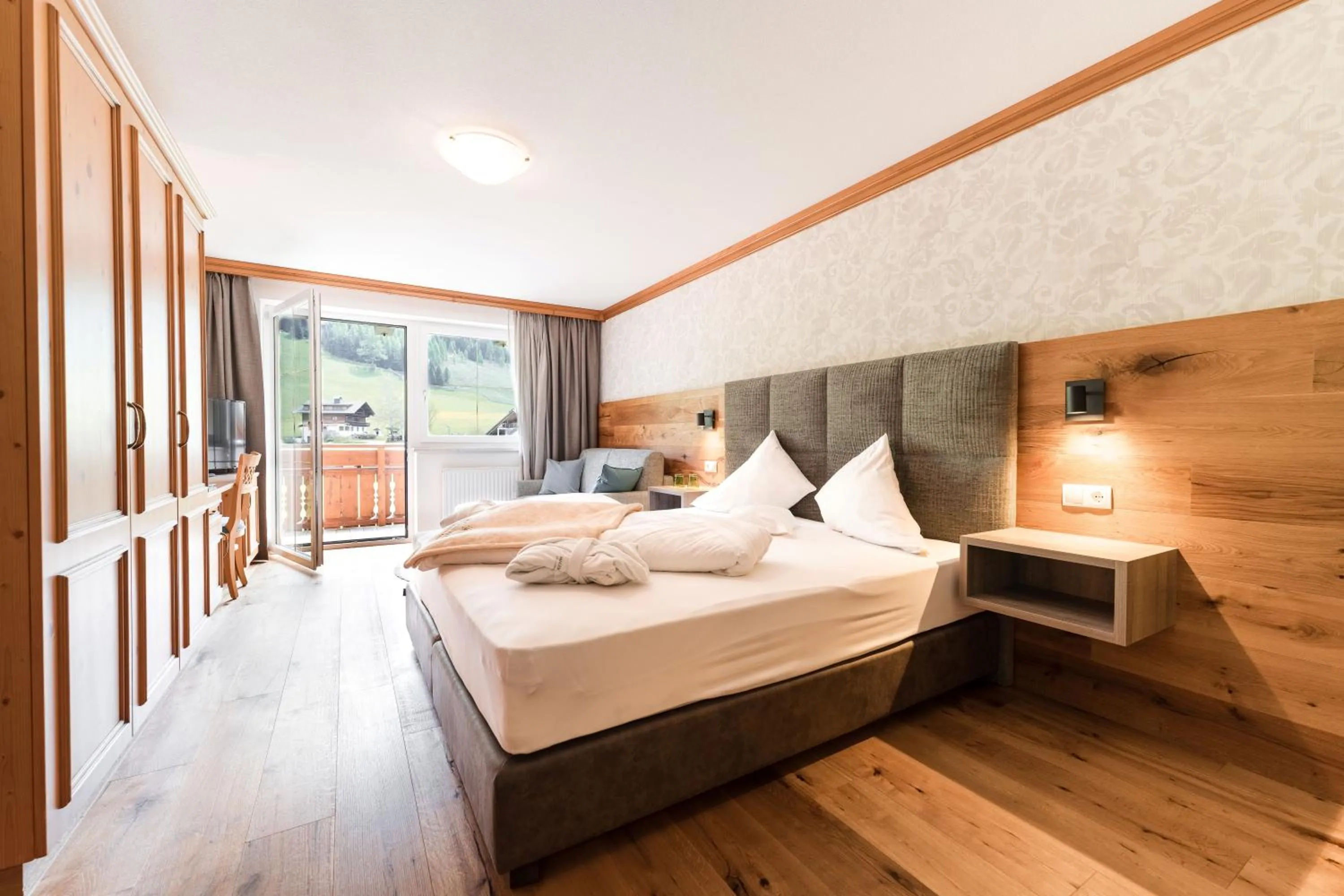 Bedroom, Bed in Vitalpina Hotel Magdalenahof