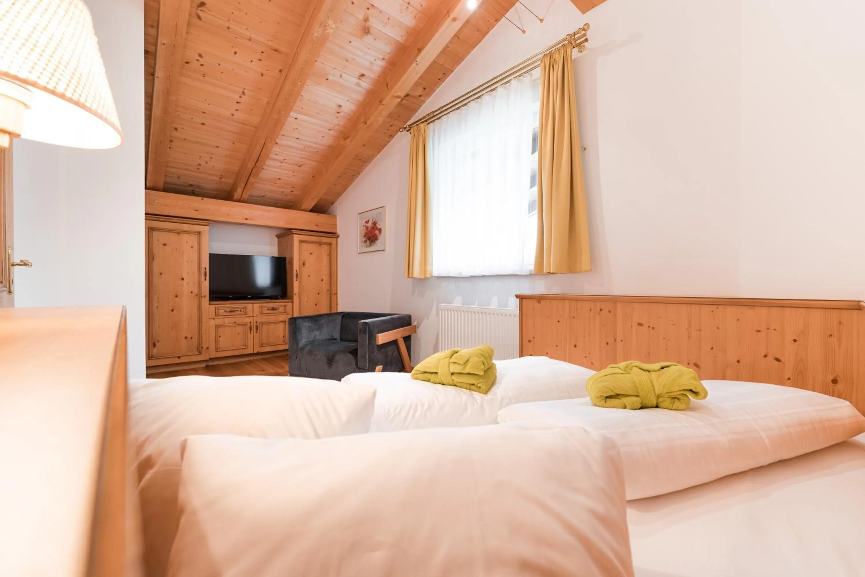 Bedroom, Bed in Vitalpina Hotel Magdalenahof