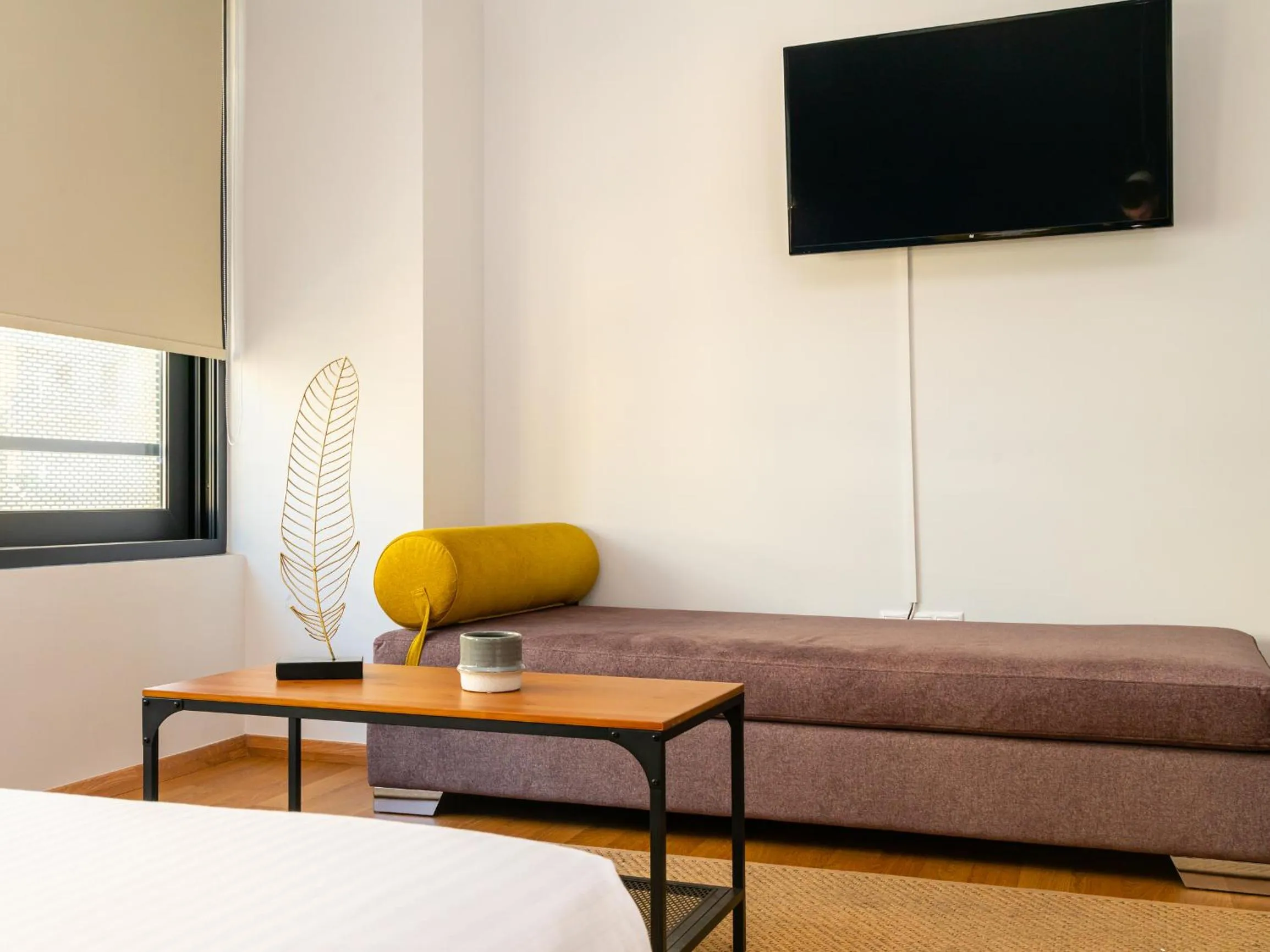 Bed in Iasonos Suites Athens