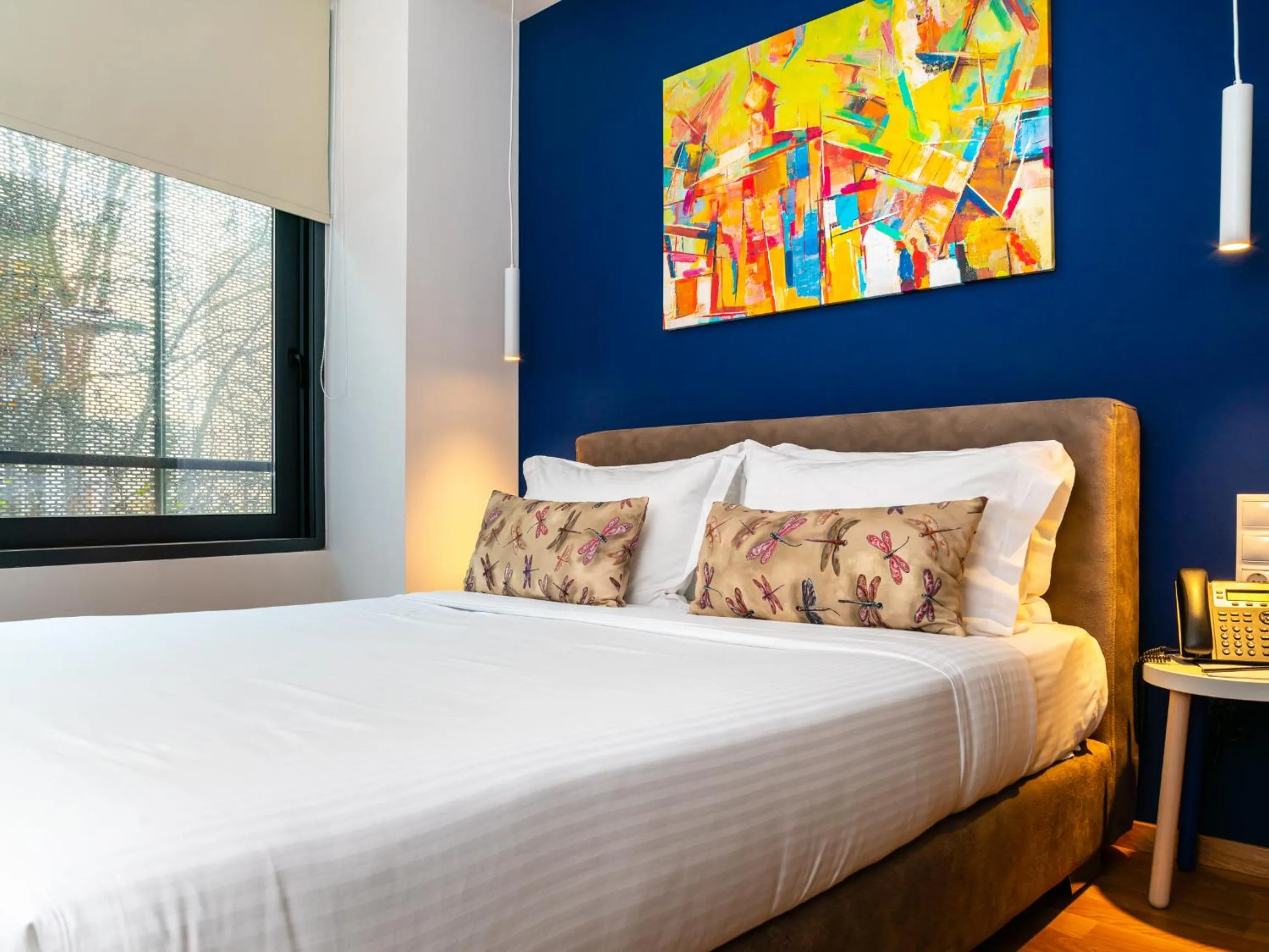 Bed in Iasonos Suites Athens