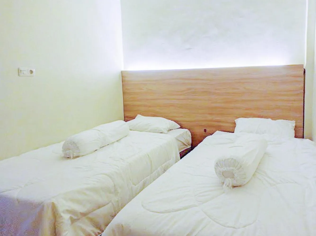 Bedroom, Bed in RedDoorz Syariah at Karema Area Mamuju